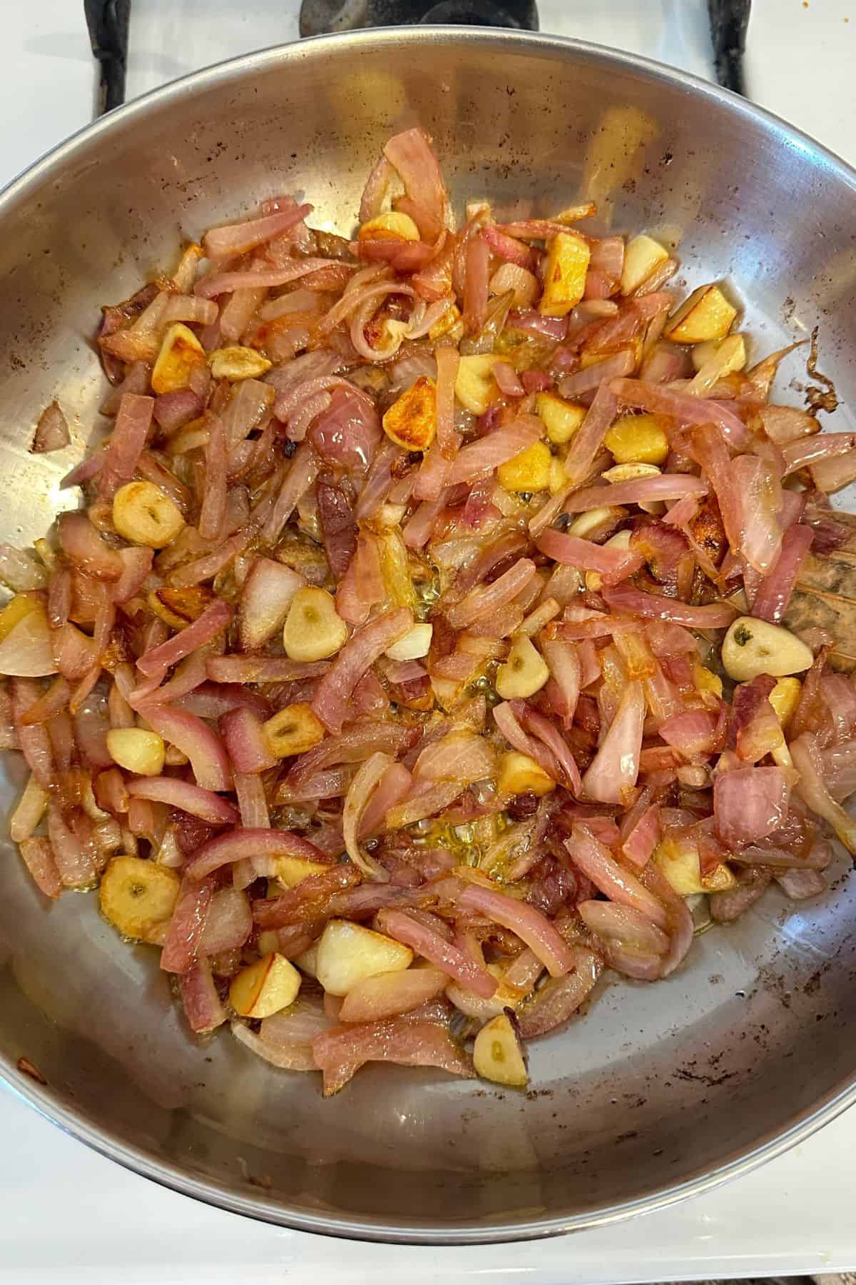 Onions are cooked until they are golden brown.
