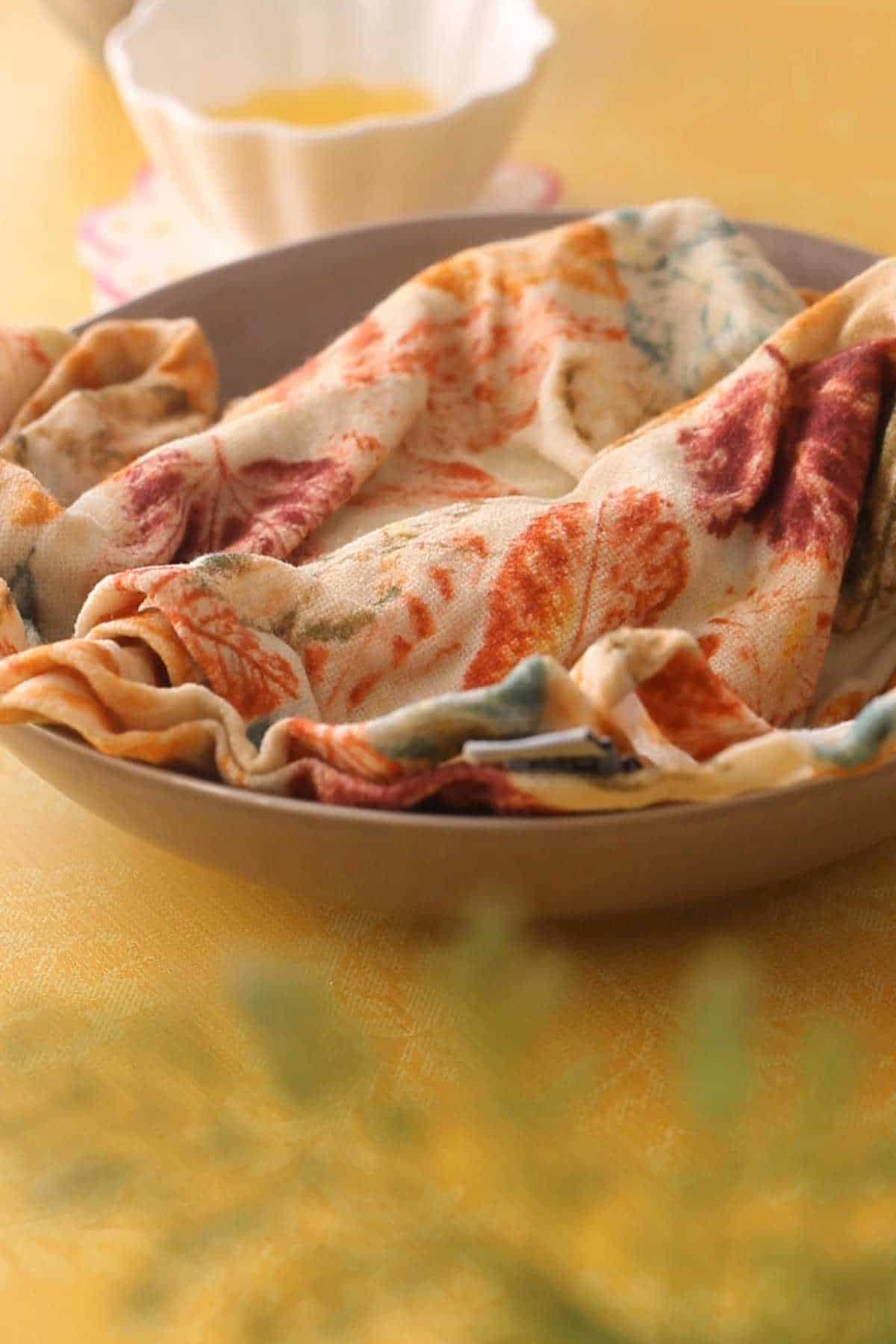 Papri dough covered with damp flour and resting.