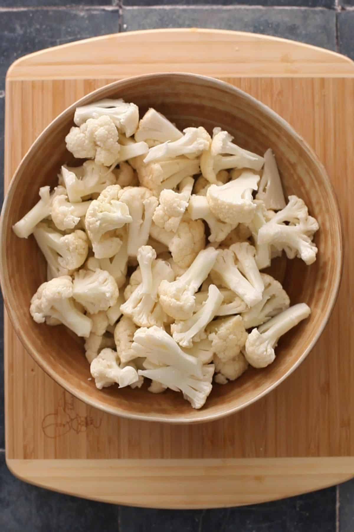 Cauliflower florets in a bowl.