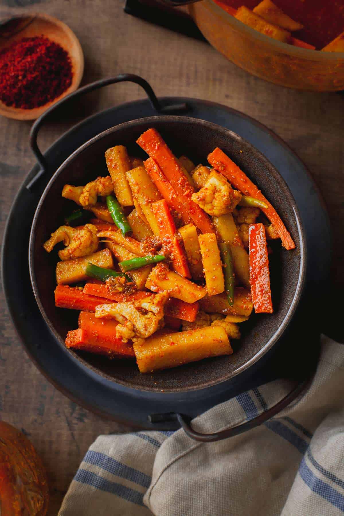 Punjabi Gajar Gobhi Achar in a grey bowl.