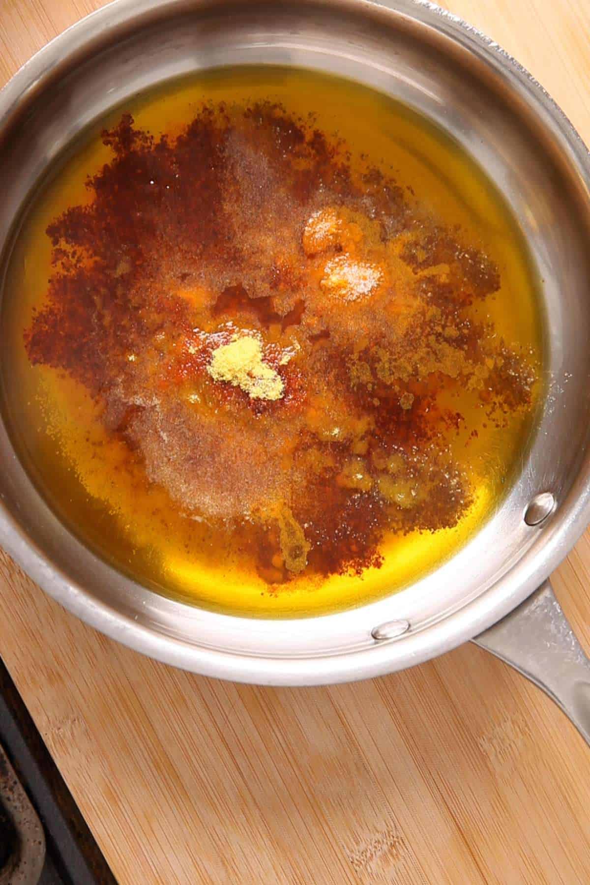 Tempered mustard oil with all the spices.