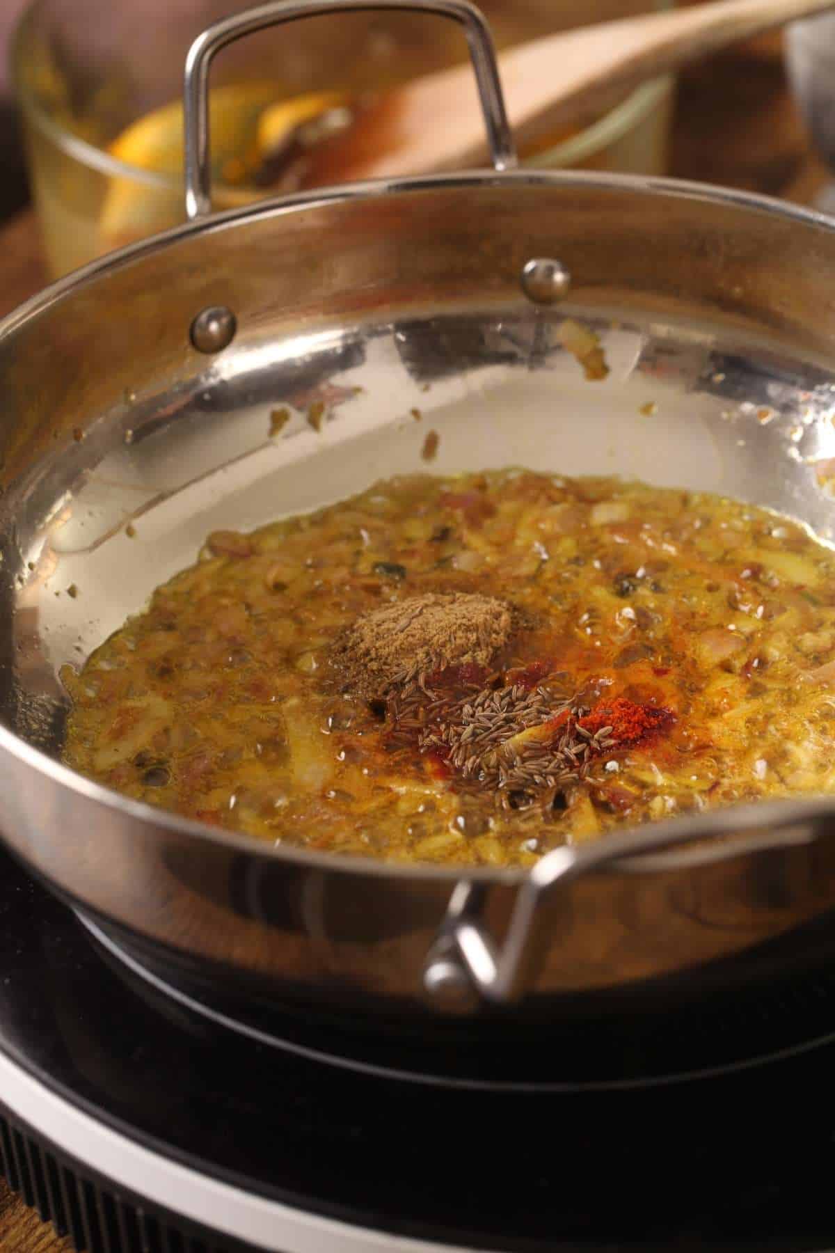 Powdered Spices in onion and oil