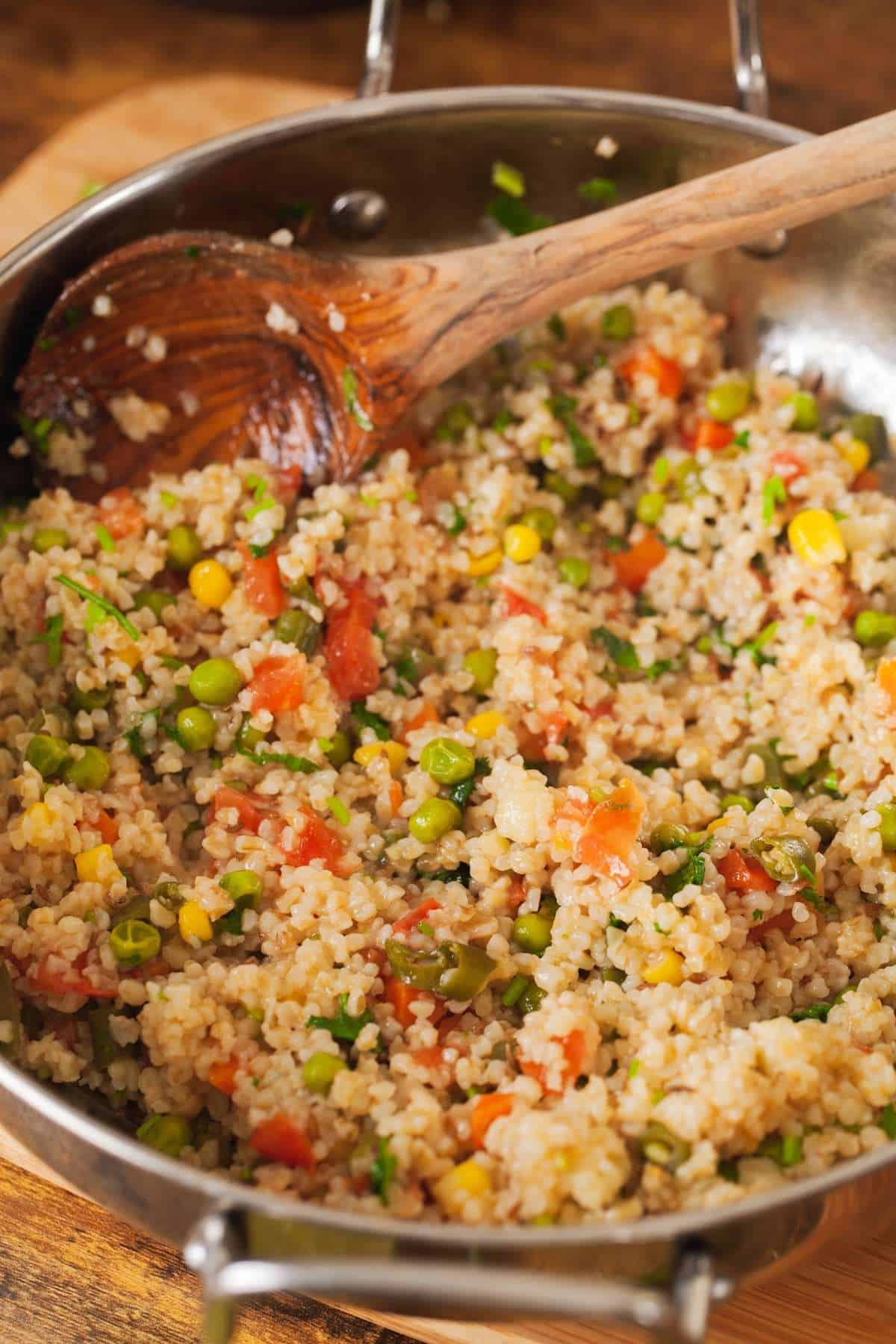 Namkeen Daliya in a Kadai(wok). 