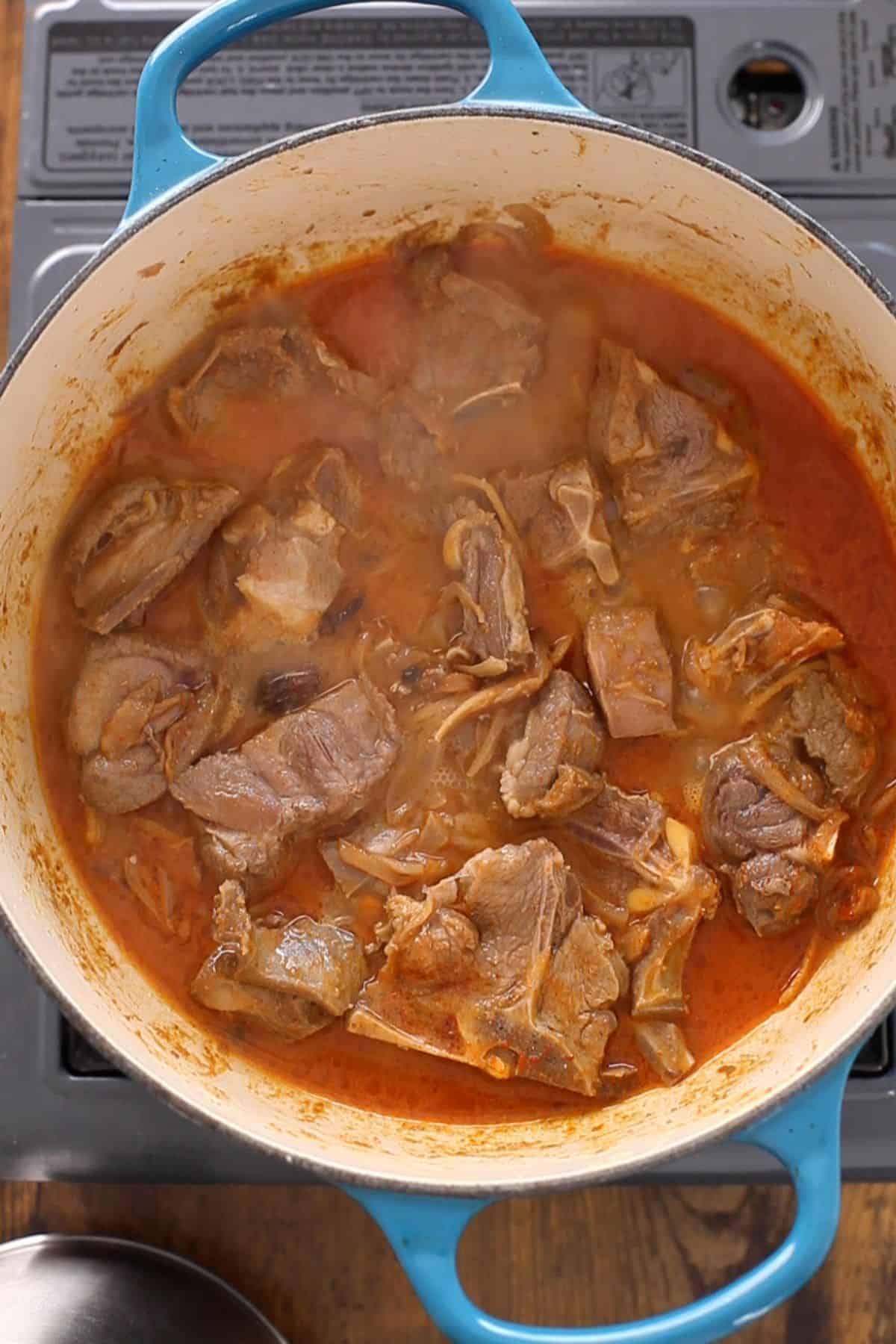 Water is added to the cooking pot. 
