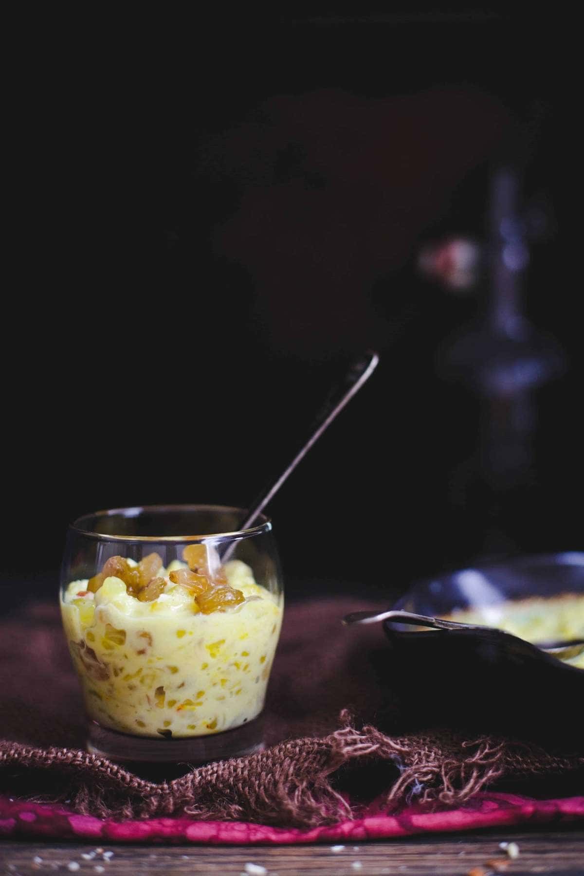 Saffron Sabudana Kheer in a small glass serving bowl.