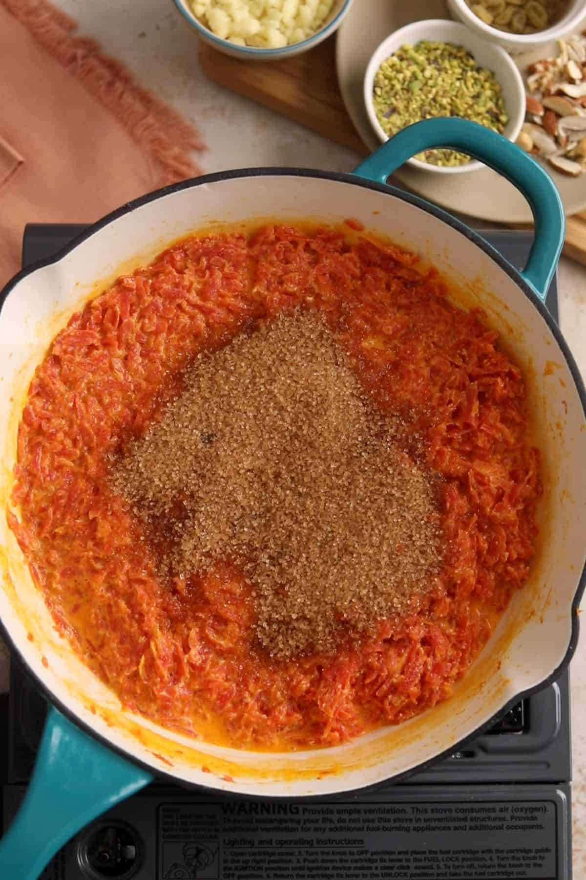 Sugar is added to softened carrots.