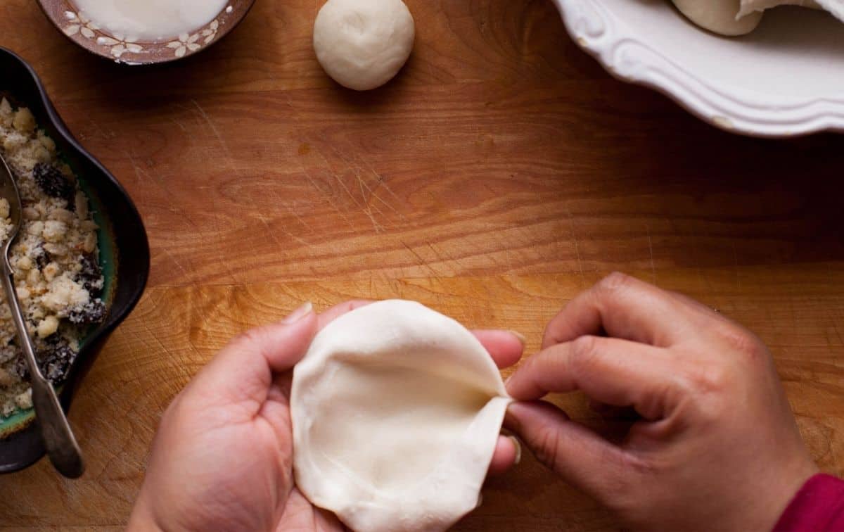 Dough is shaped into gujiya