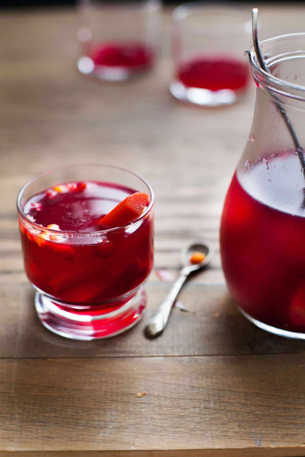 Carrot kanji drink in a small cup in backlight.