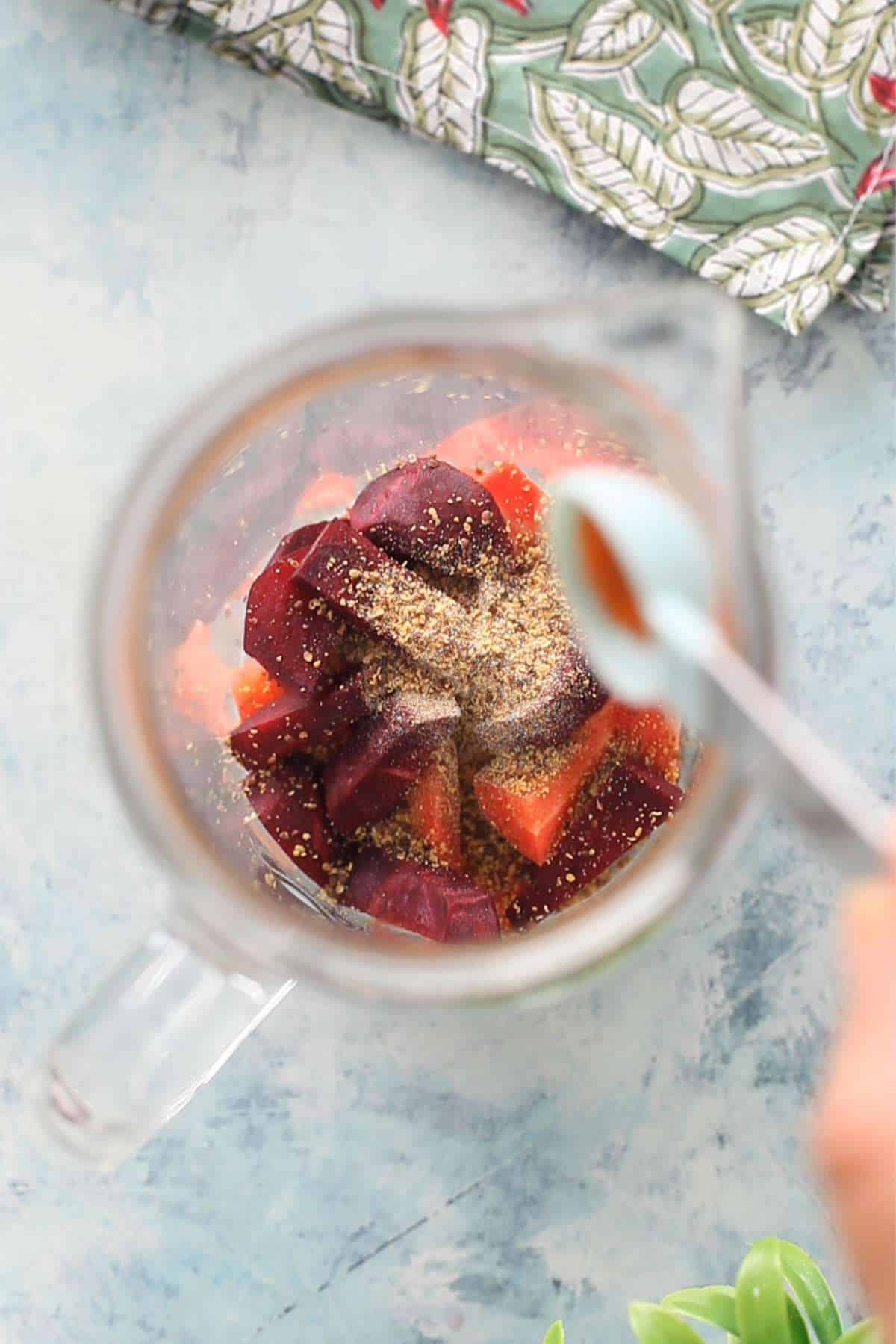 Ground mustard powder is added to carrots.