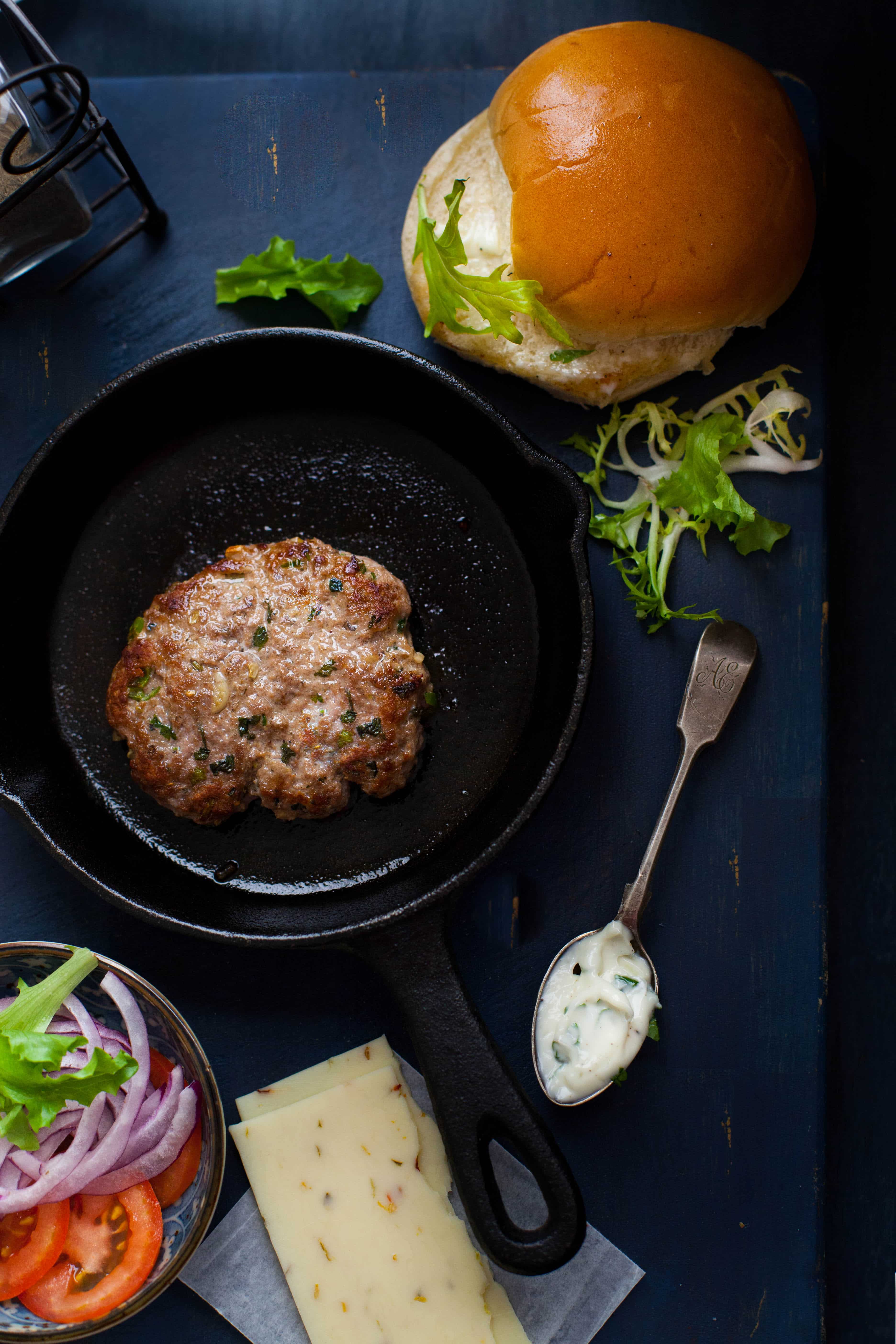 Spiced Lamb Burgers With Garlic Mint Yogurt Sauce.
