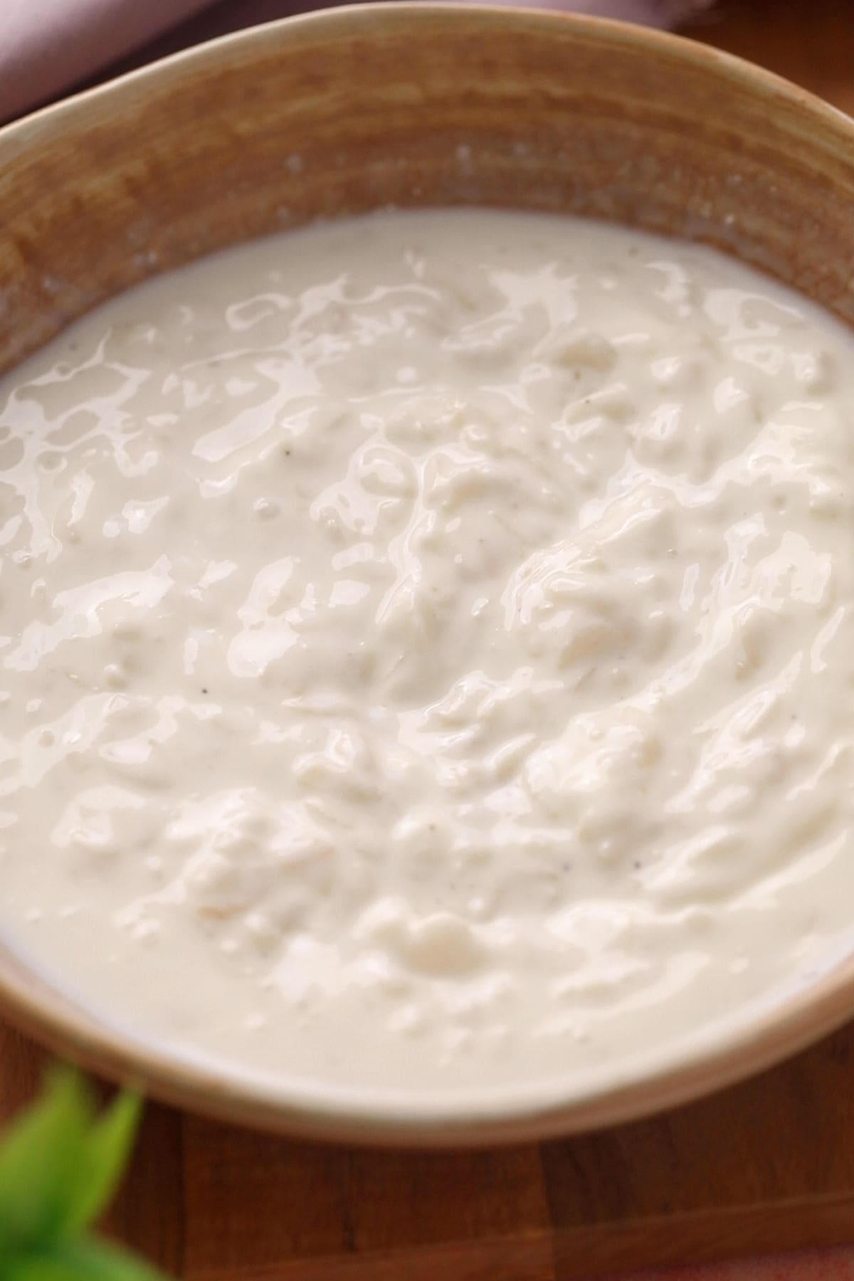 Poha and yogurt are mixed into a velvety consistency.