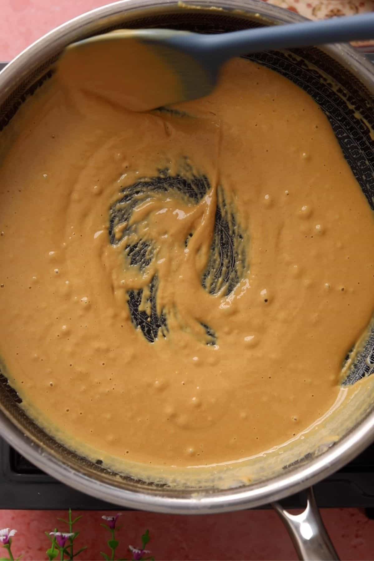 Gram flour is fully roasted and is golden in color. 