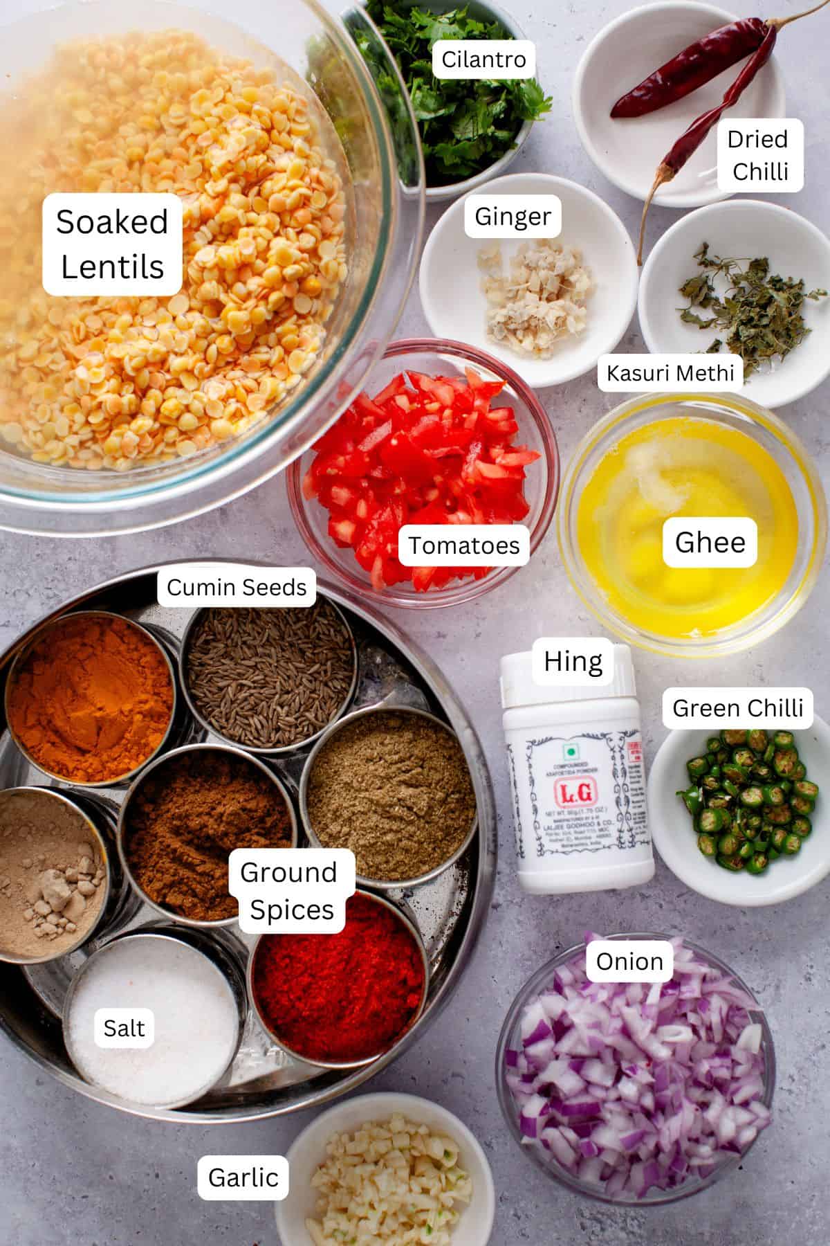 Ingredients needed for cooking dal tadka.