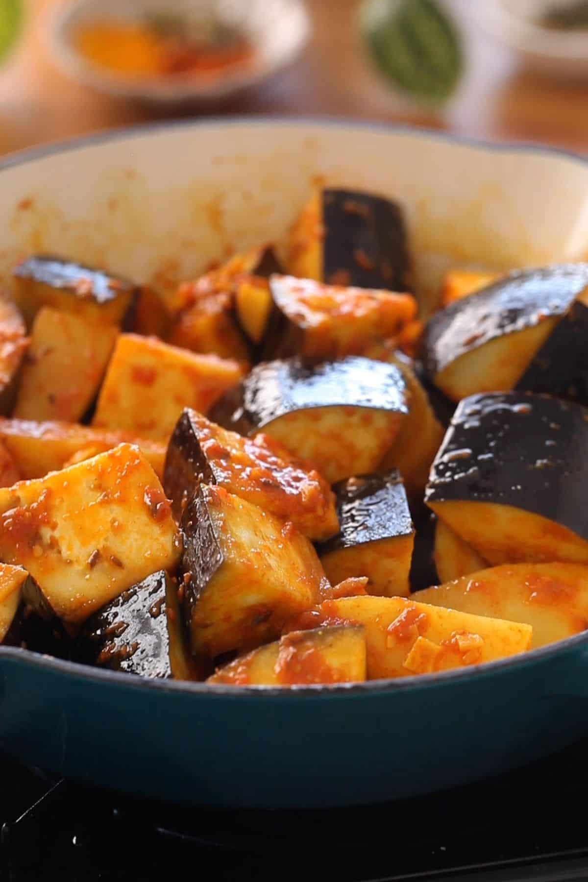 Chopped eggplants mixed with masala and potatoes.