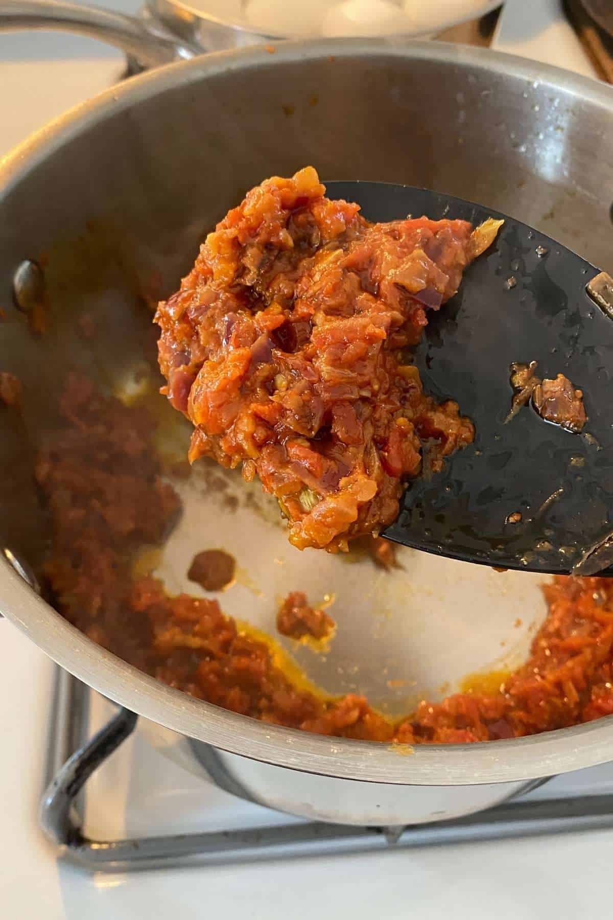 Sauted masala looks thick and shiny.