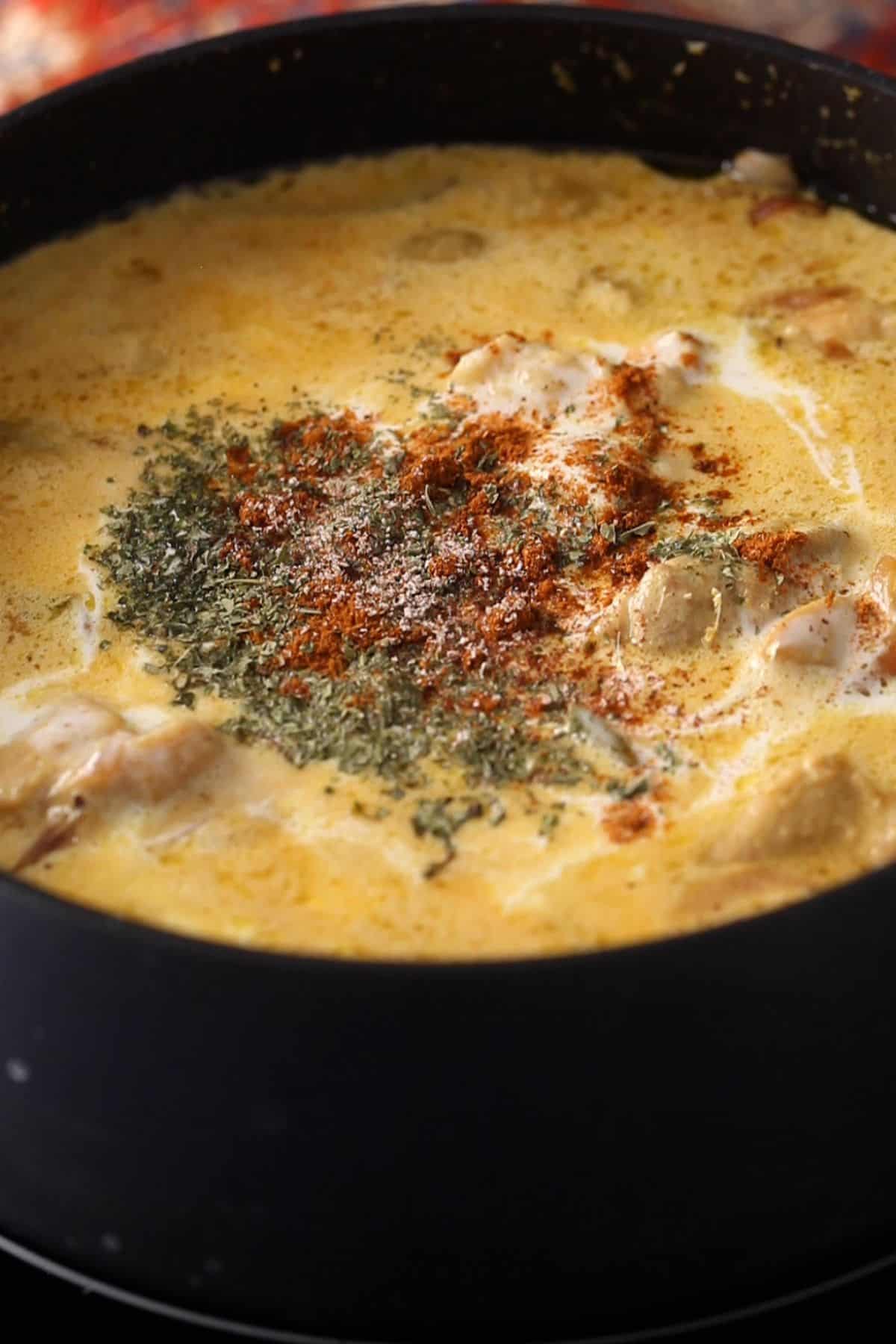 Finishing spices are added to korma and its ready to serve.