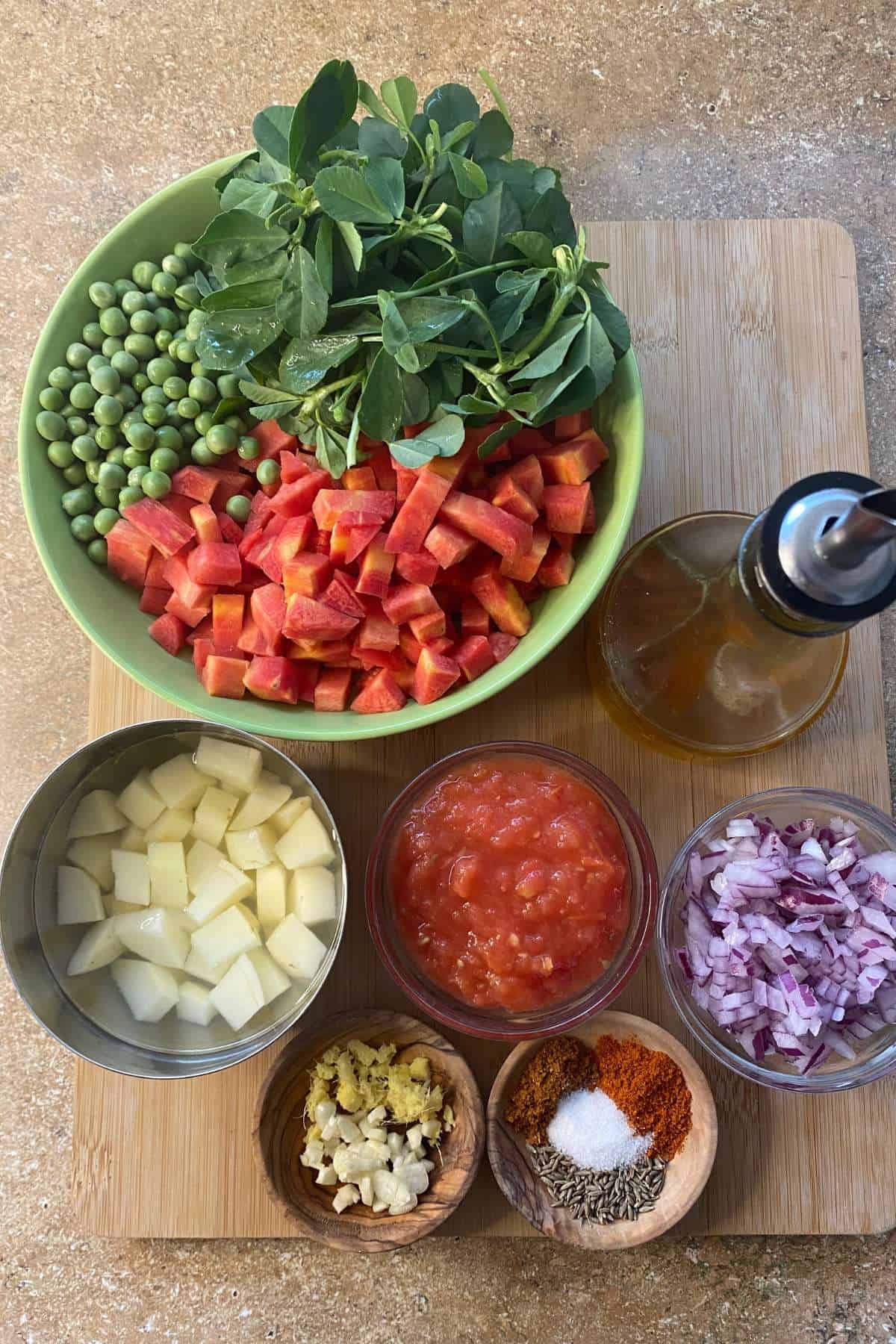 Ingredients Needed to Make carrot peas and potatoes dry curry.