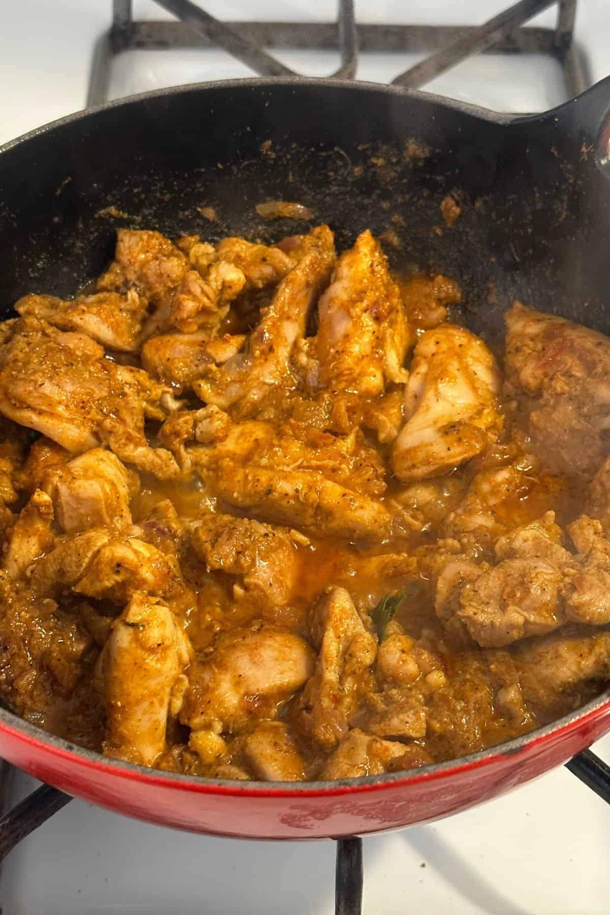 Chicken is seared with vindaloo masala.