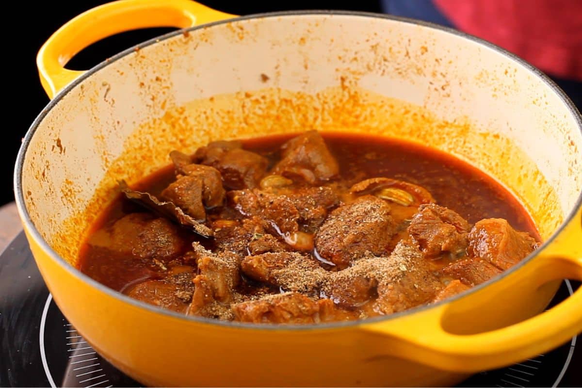 Lamb rogan josh is finished with ground frangrant spice blend.