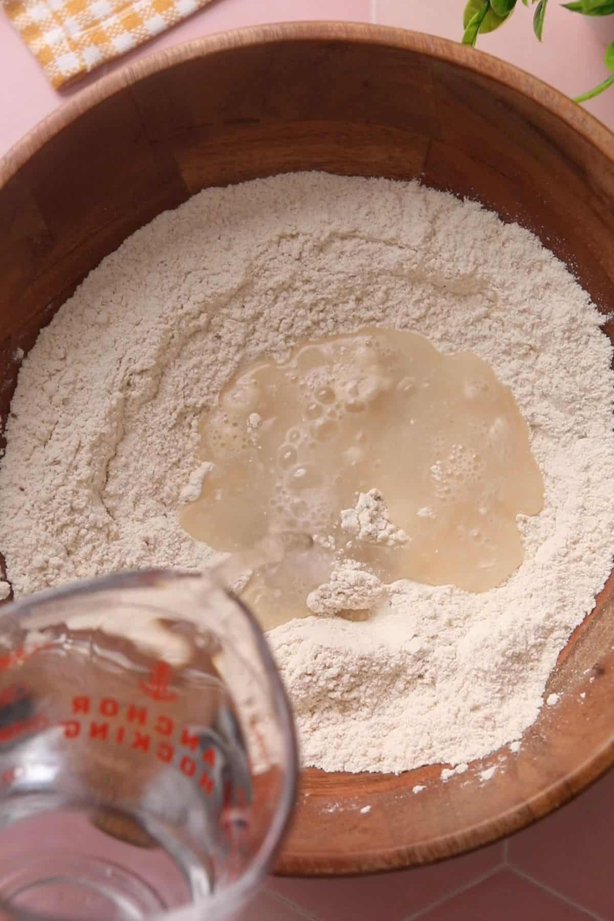 Water is added to the poori flour mixture.