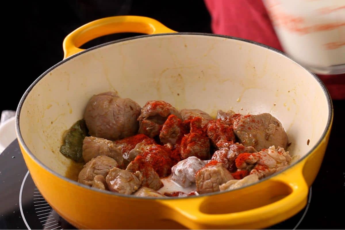 Kashmiri chili powder and yogurt are added to lamb.