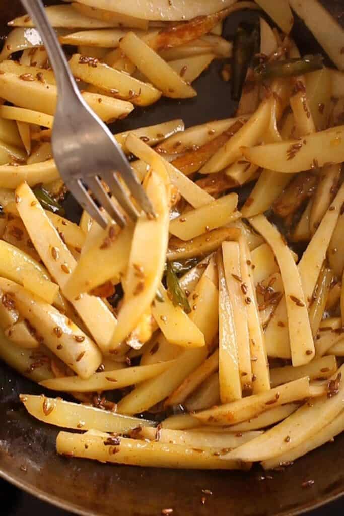 Cover and Cook arbi till for tender.