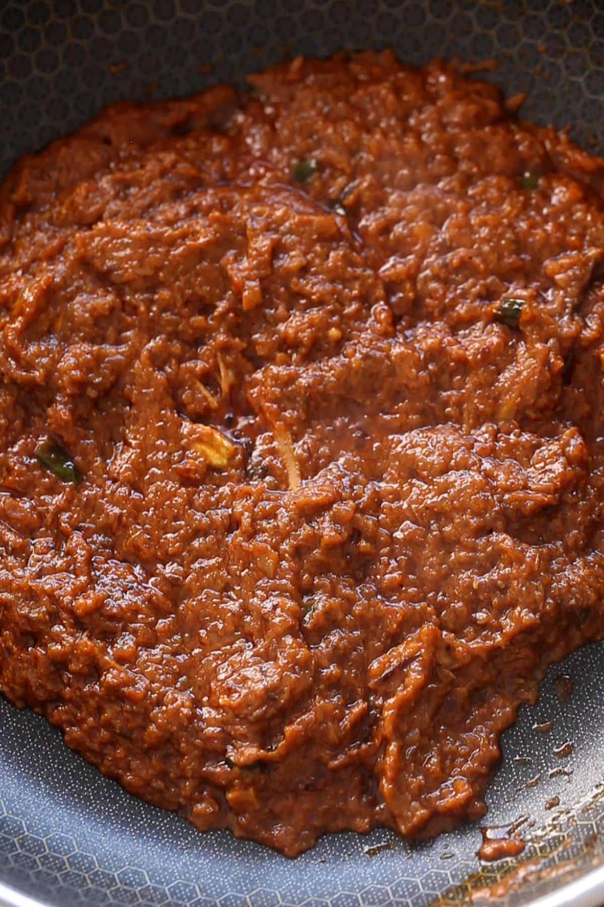 Masala is cooked until we see tiny bubbles of oil.