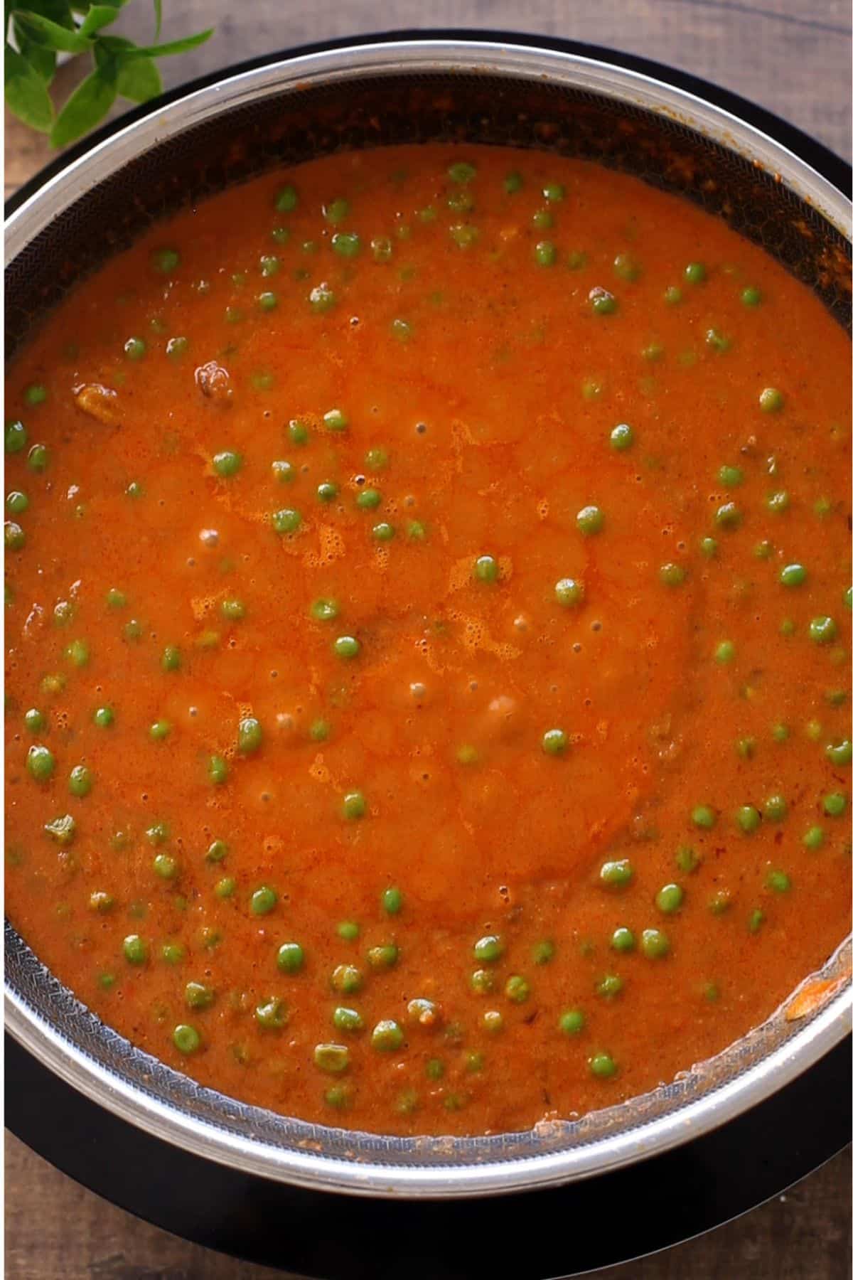 Peas are softened after cooking in the masala.