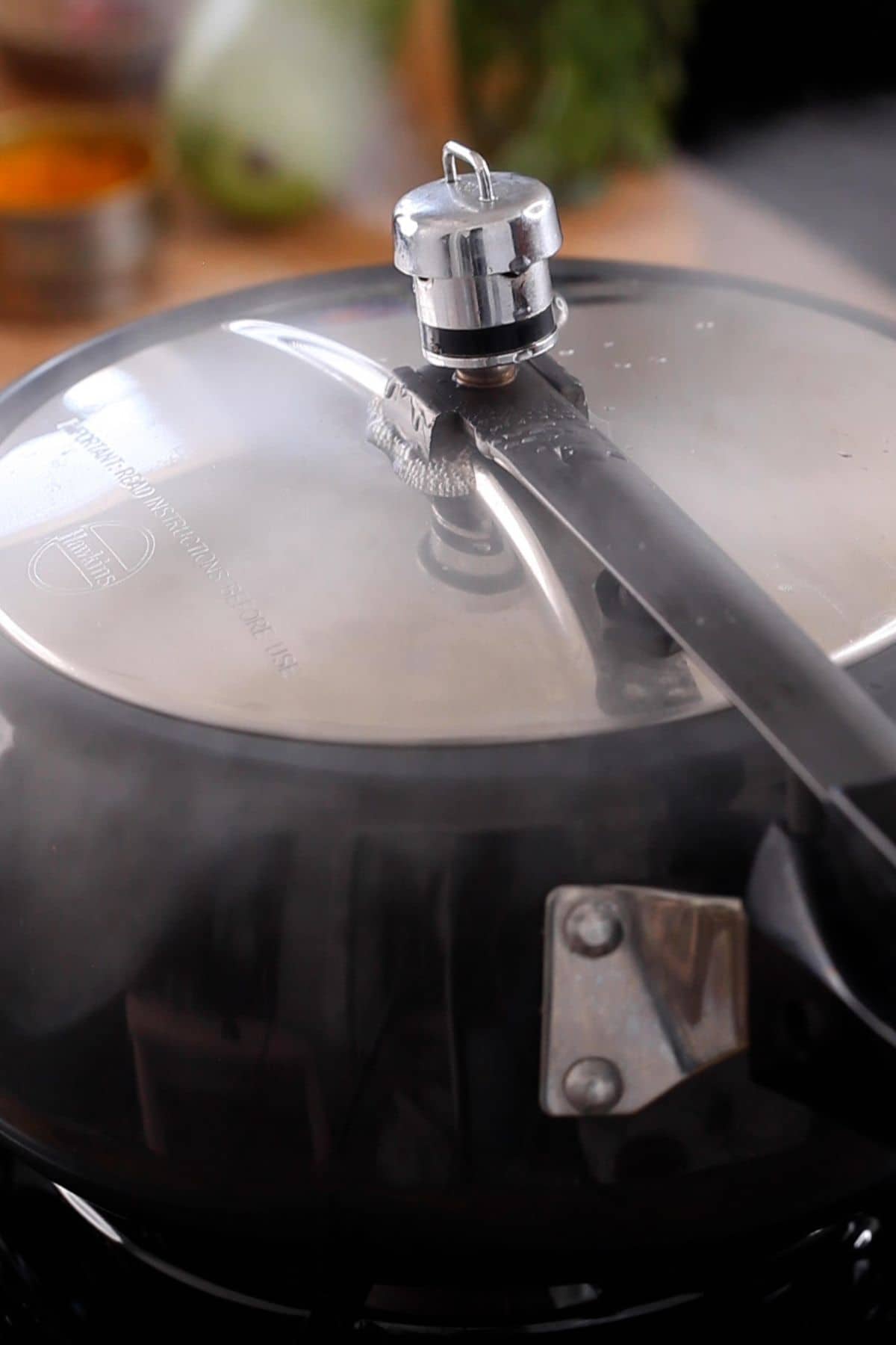 Cooking lentils and lauki together on pressure cooker whistle. 