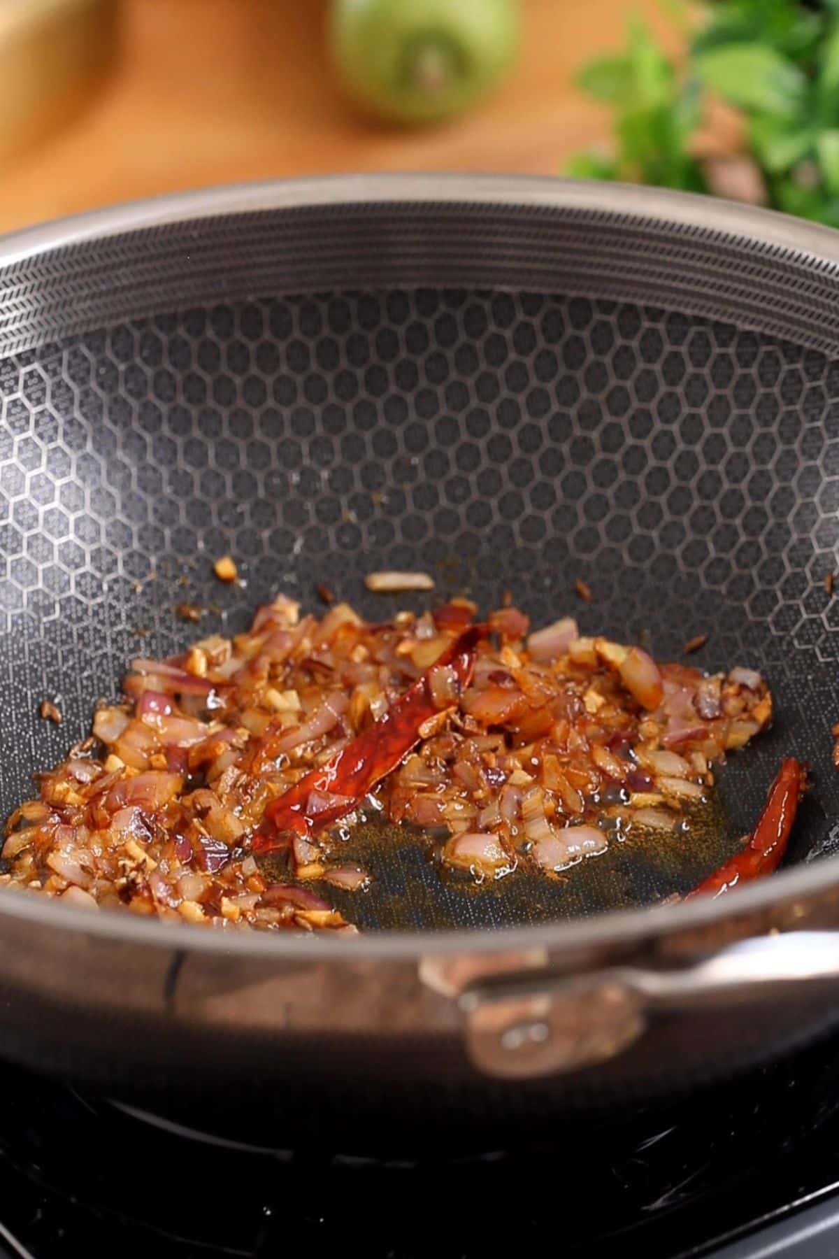 Browned onion and chili powder tadka for chana dal.