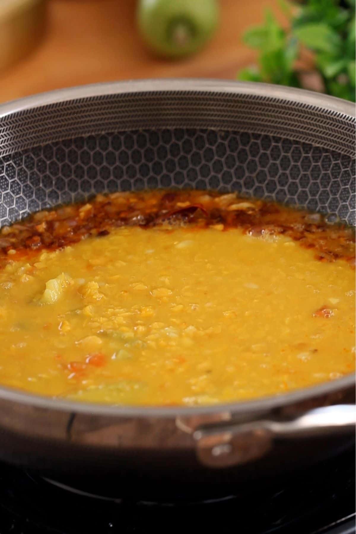 Chana dal is simmered with the tempering.