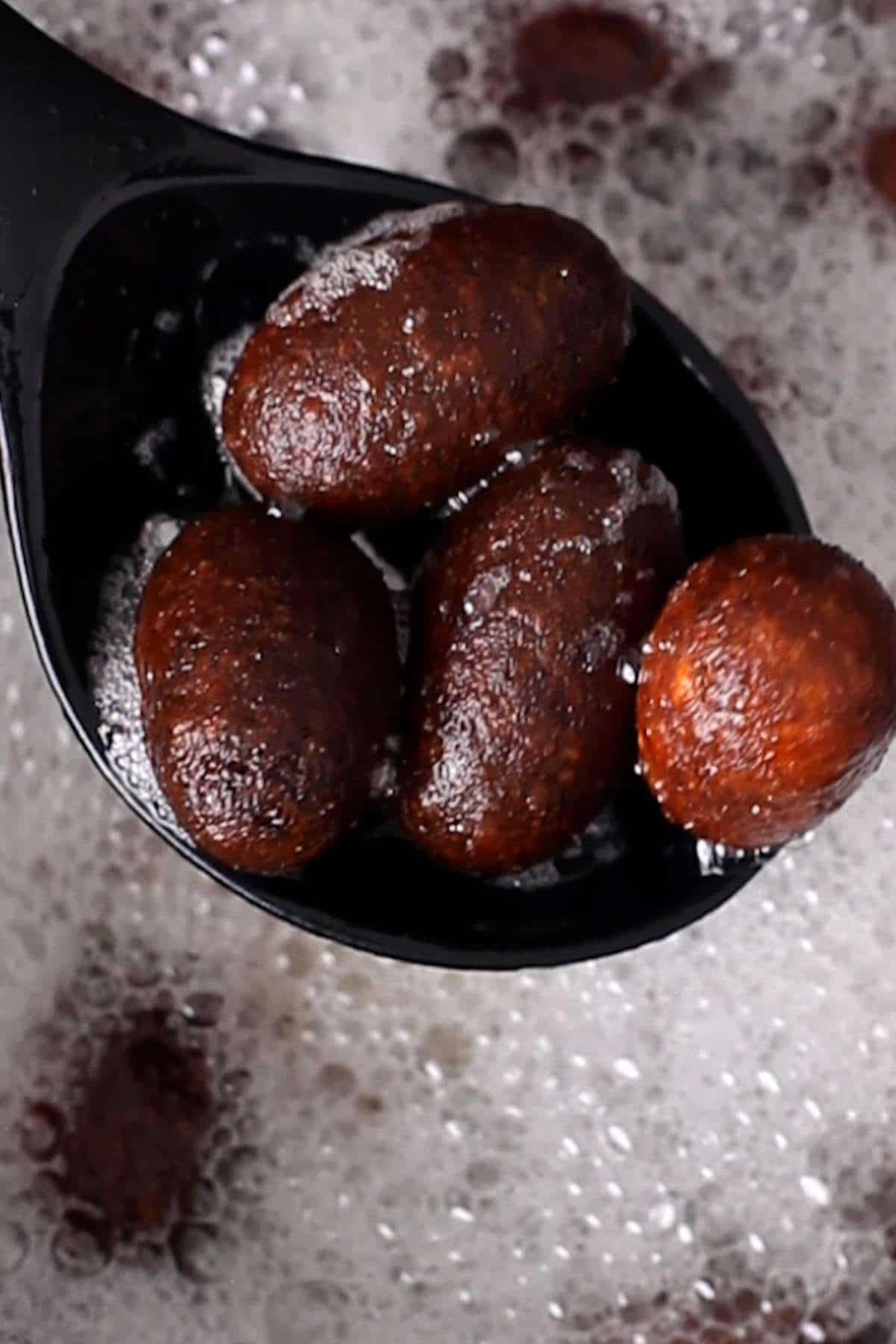Deep fried kala jamun.