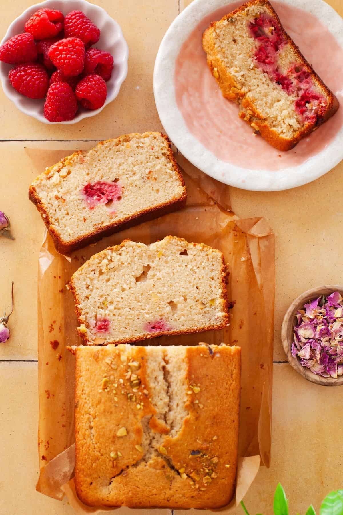 Overhead image of rose water cake with cake slices.