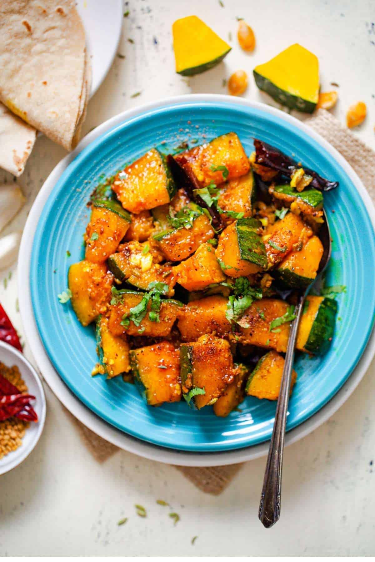Sweet and Sour Kabocha Squash on a blue plate.