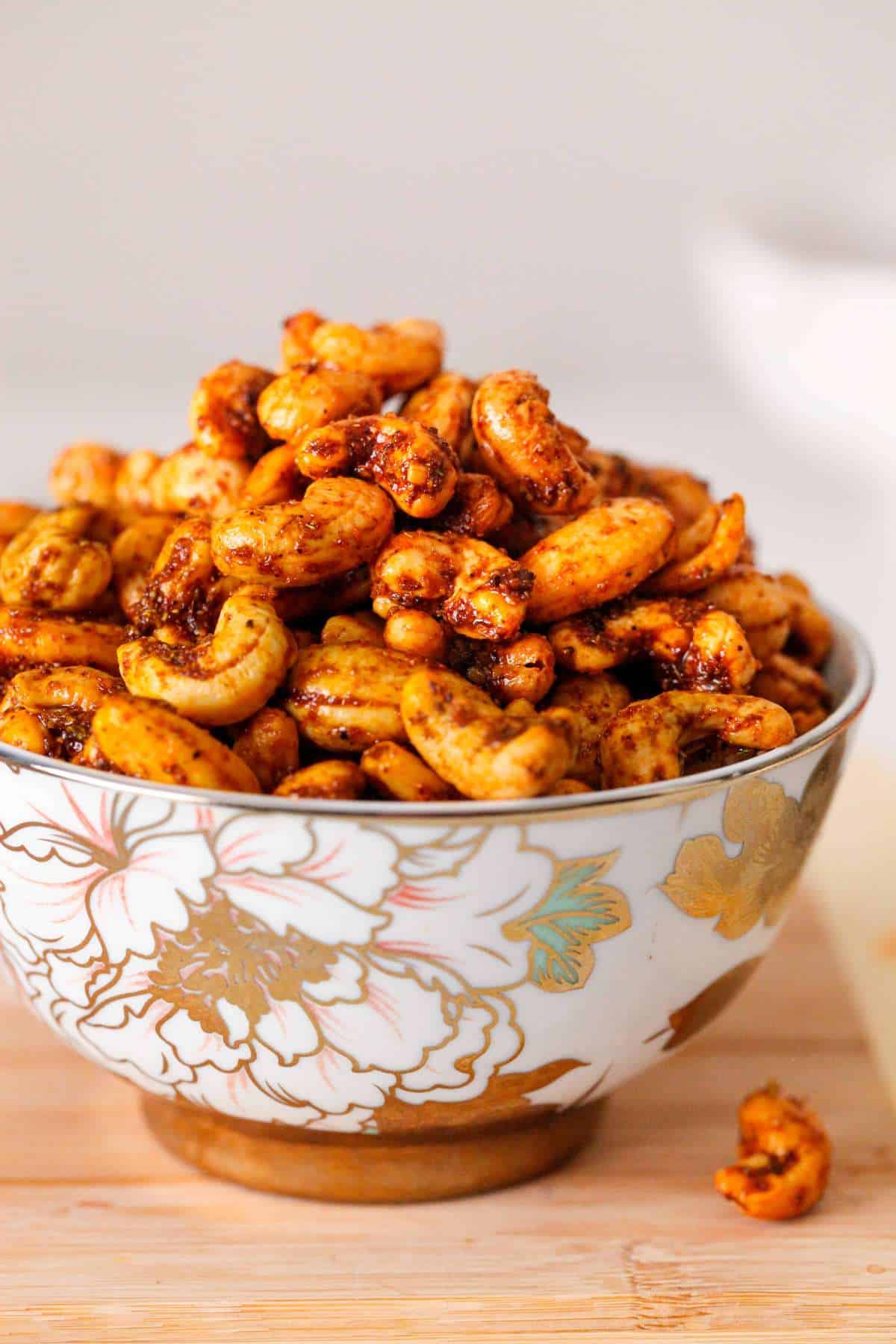 Masala Kaju in a white and gold bowl.