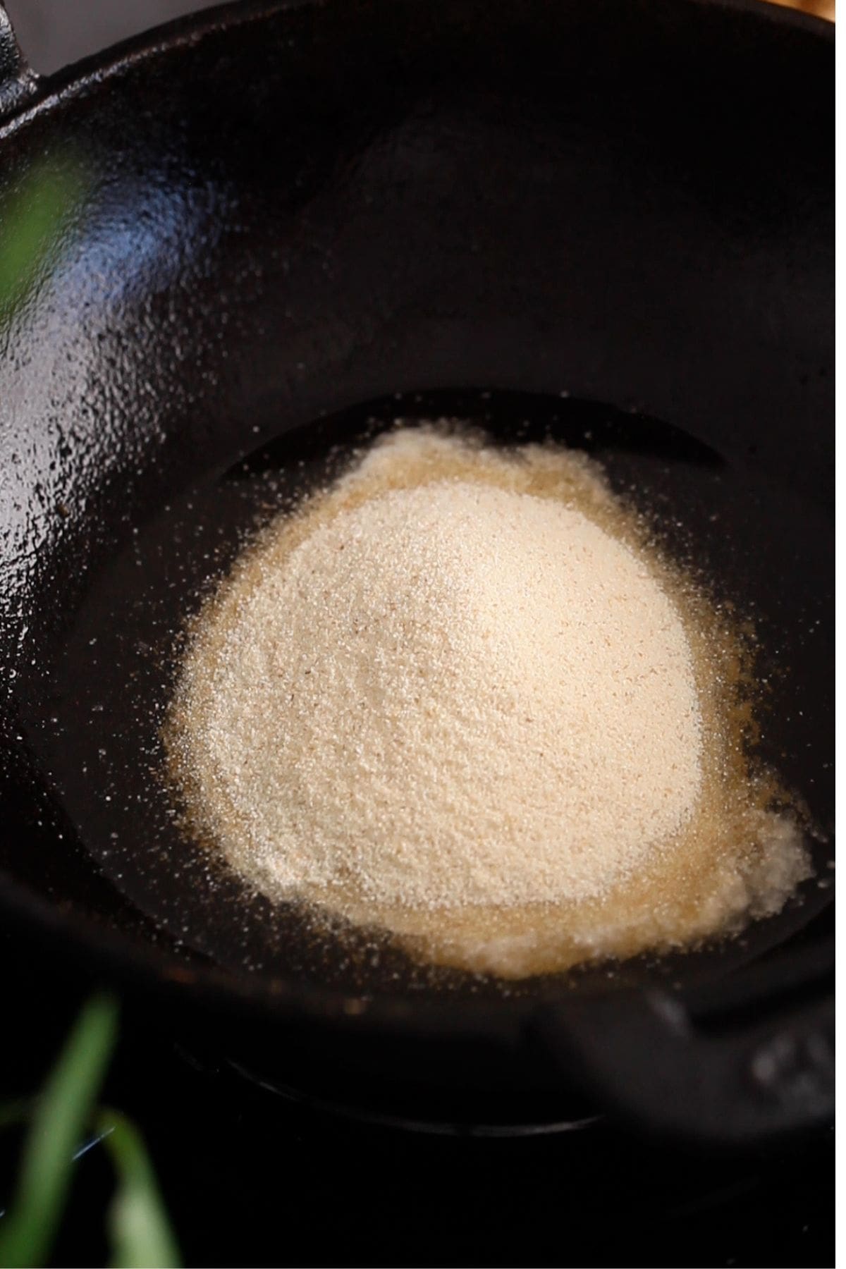 Semolina is added to ghee for toasting.