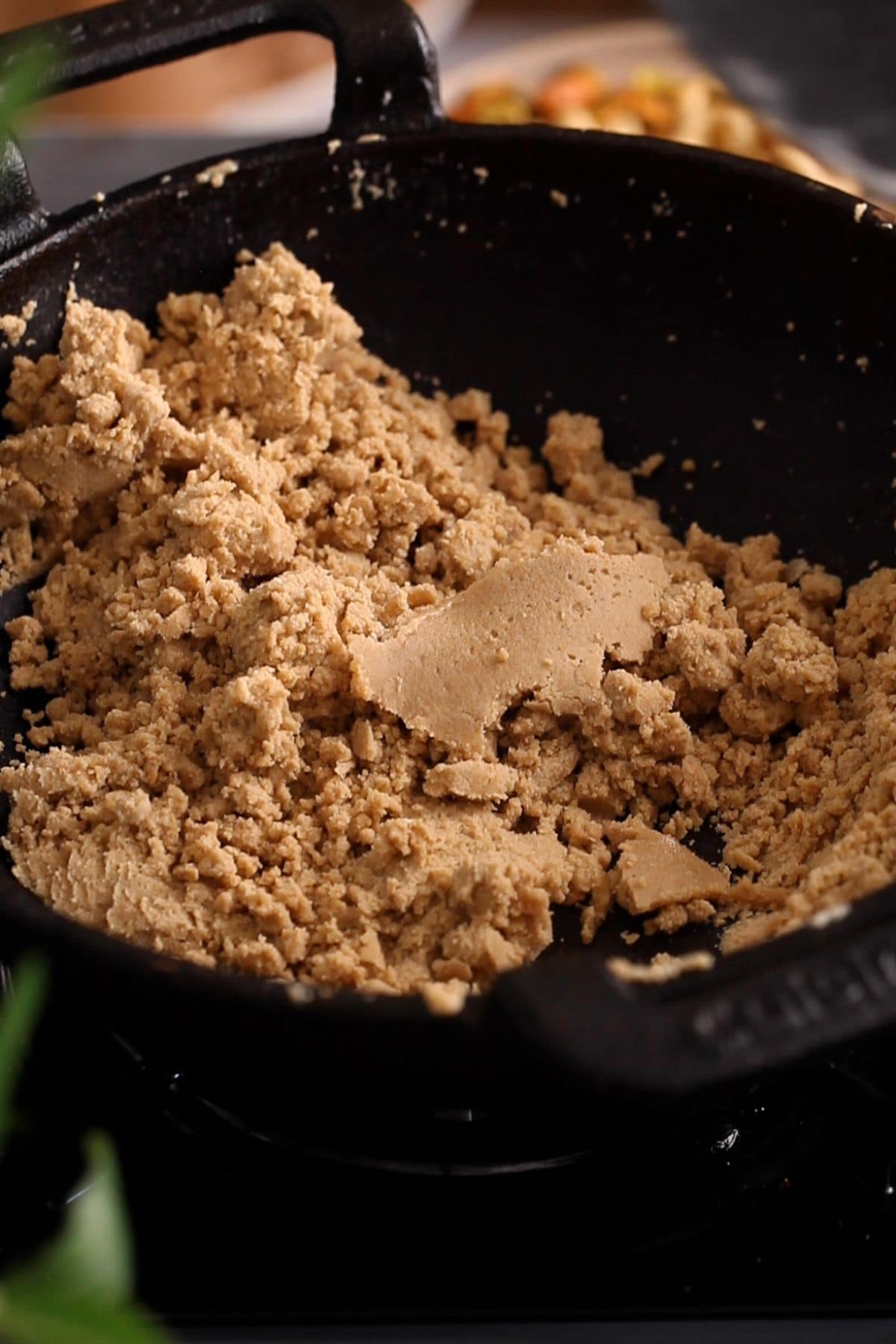 Atta is slow roasted until it is golden brown in color.