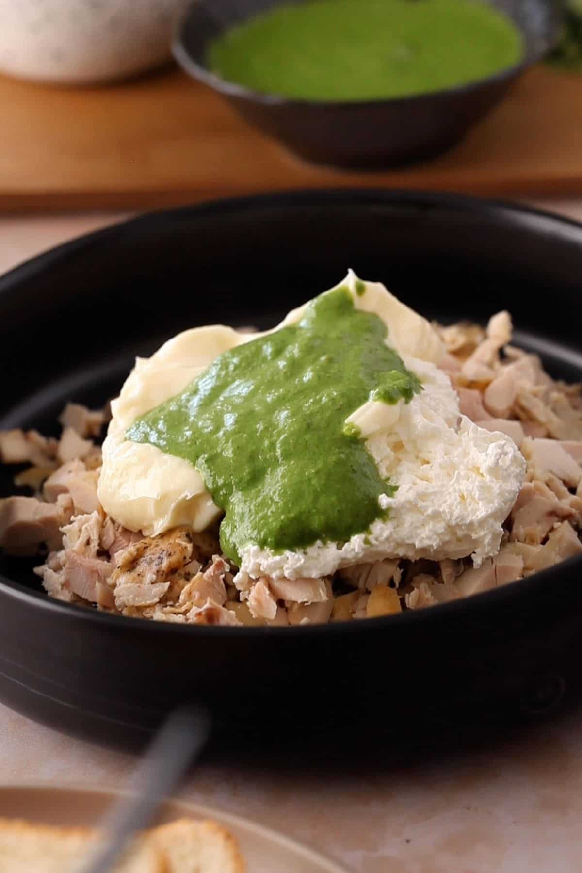 Chopped rotisseri chicken topped with cream cheese, mayonnaise and green chutney.