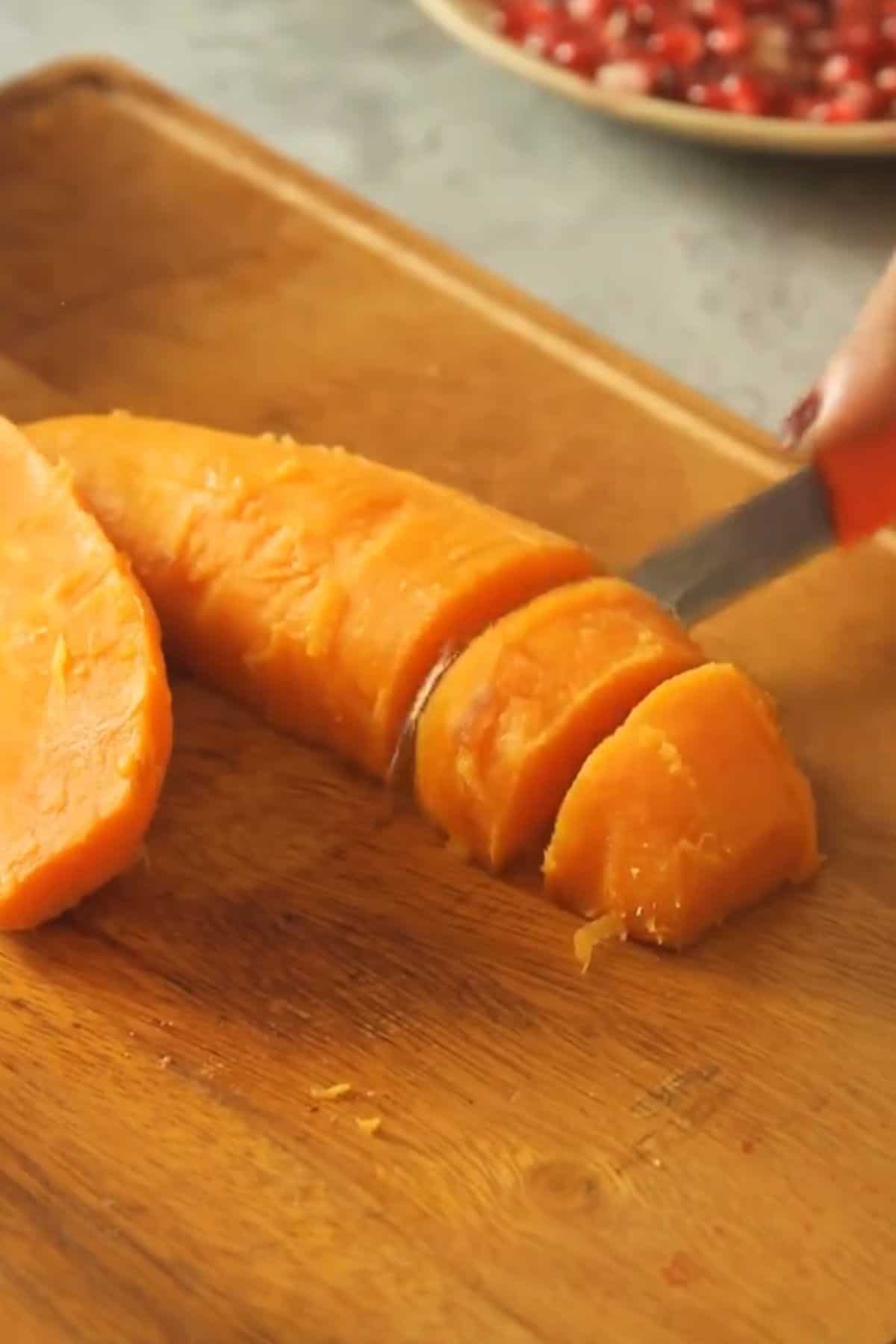 Roasted sweet potatoes are cut into small pieces.
