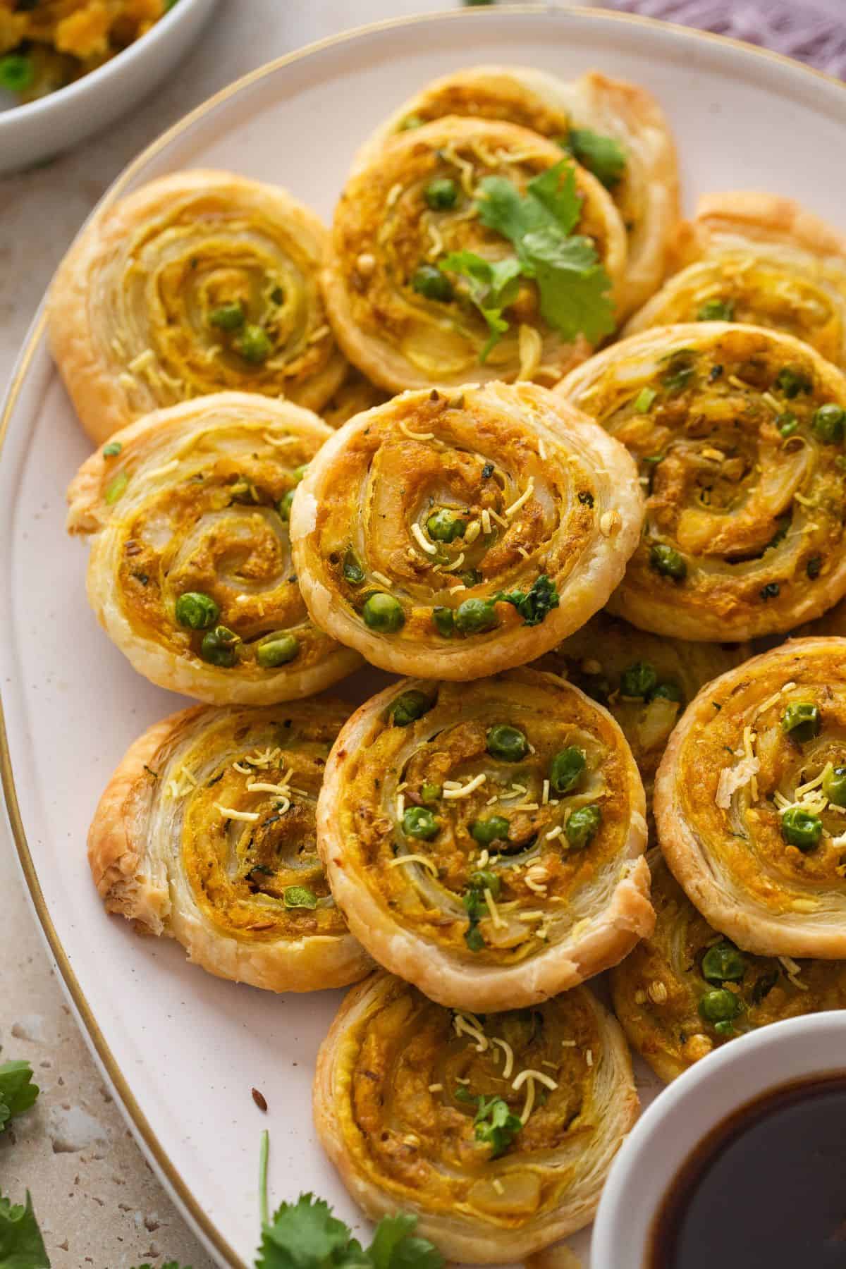 Close up shot of aloo samosa pinwheel.