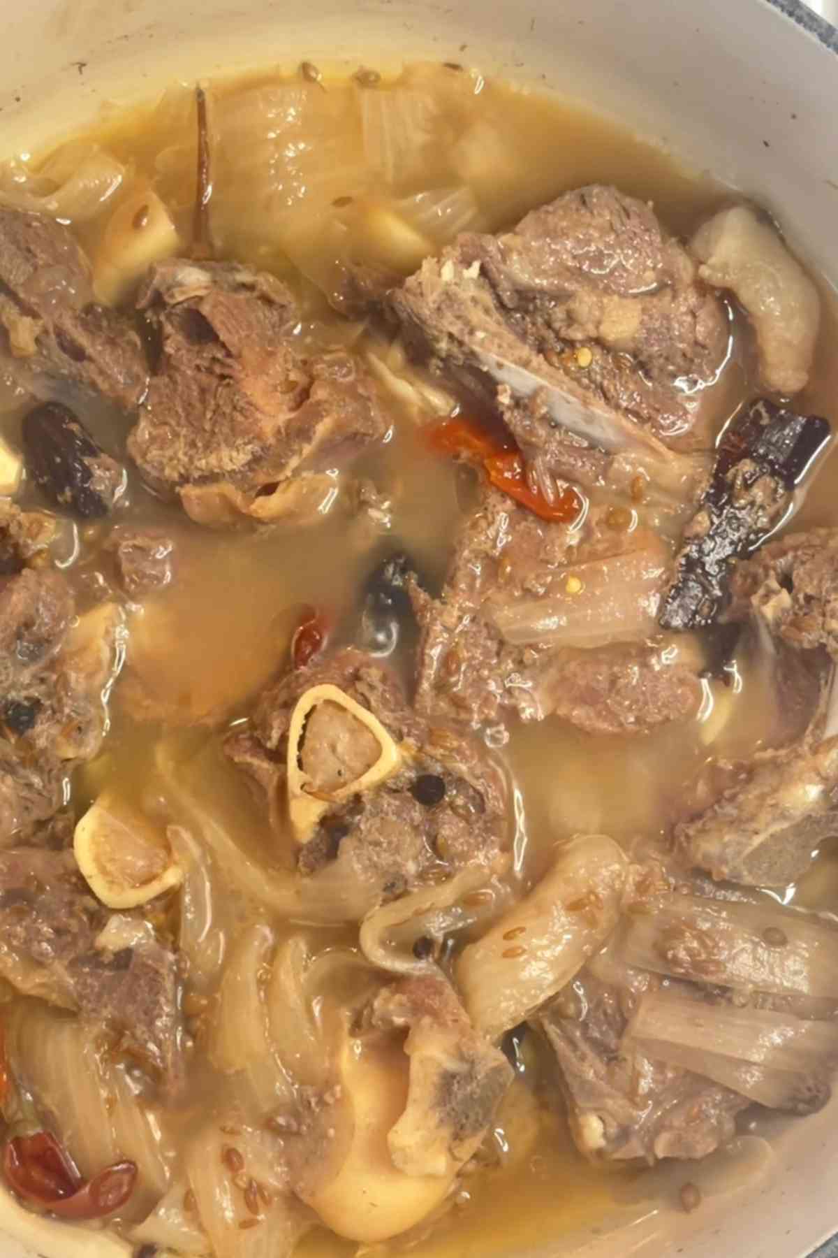 Mutton stock in a dutch oven.
