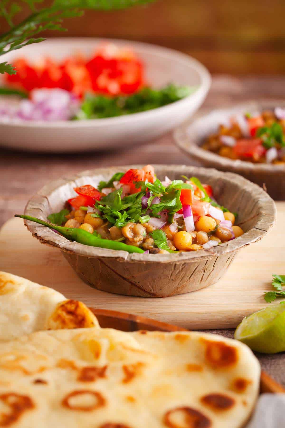 Matar Kulcha chaat served in a leaf bowl.