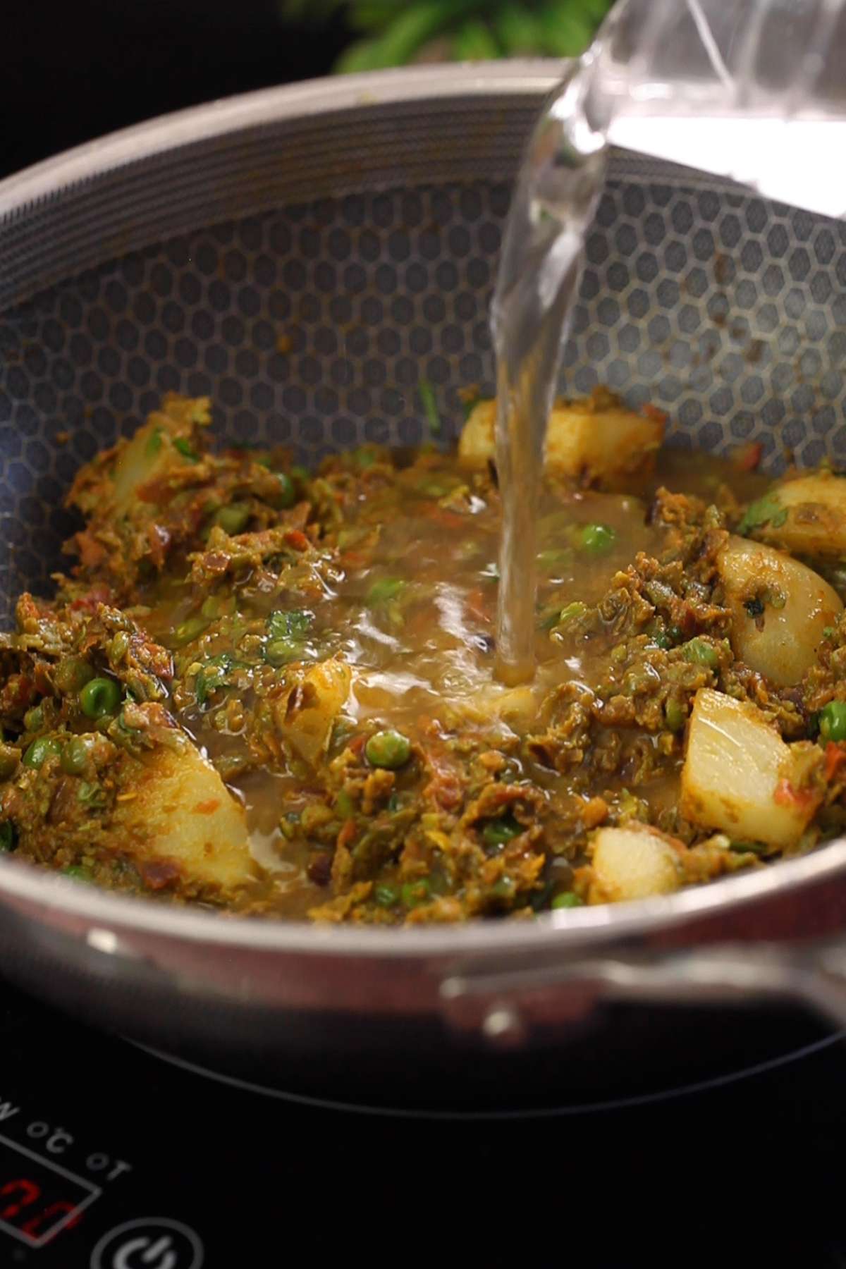 Add water and cover and cook the nimona. 