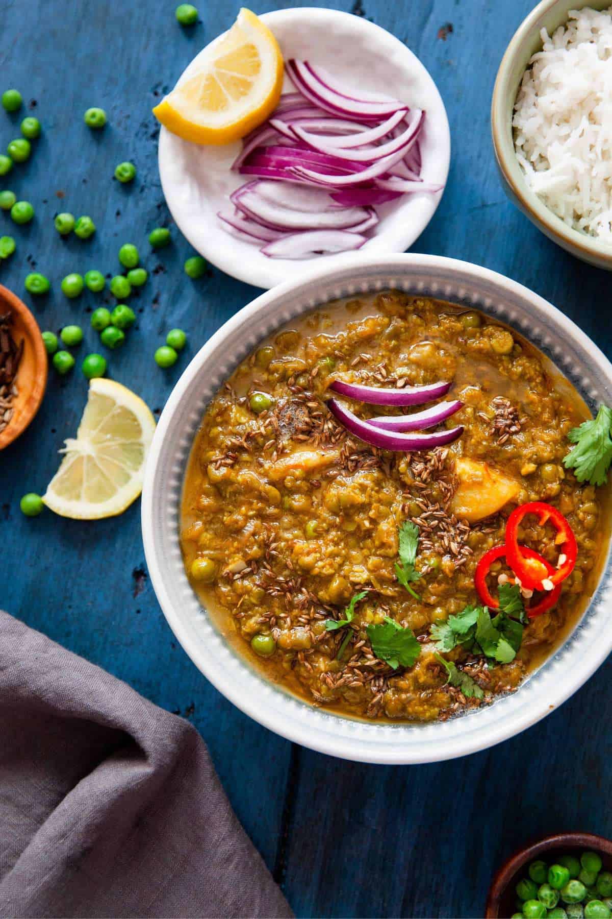 North indian ground green peas curry in a white bowl.