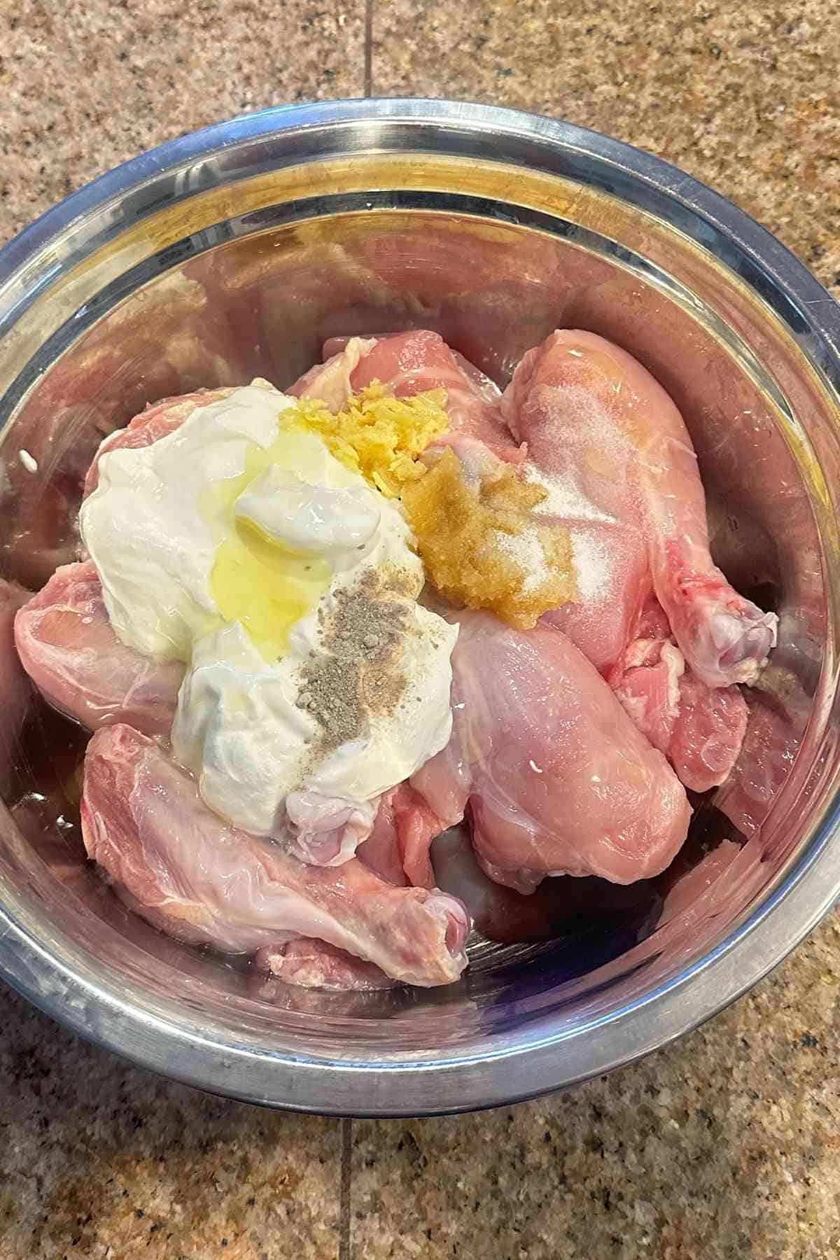 Chicken marinated with yogurt, ginger garlic paste and white pepepr powder.