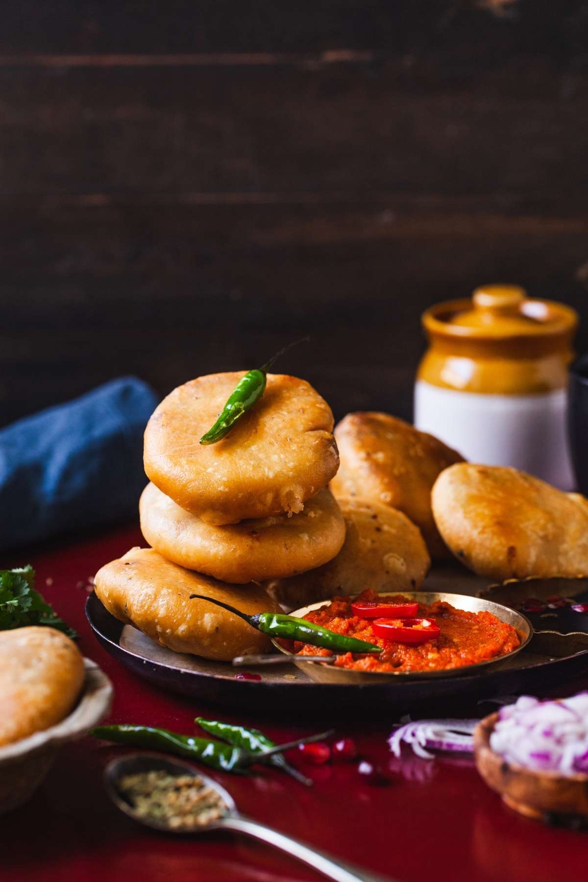 Rajasthani Pyaz Kachori Stacked with green chilli on top