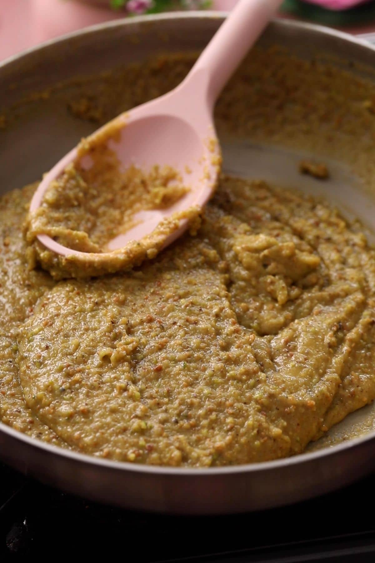 Pistachio mixture is coked on low heat.