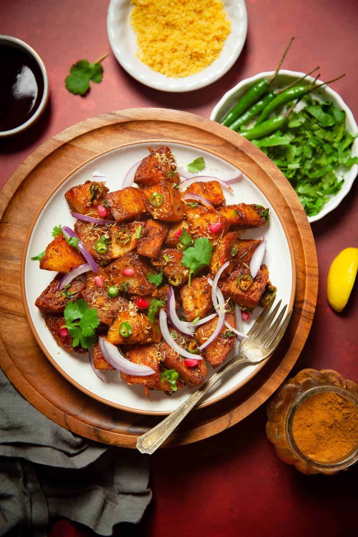 Delhi Style Aloo Chaat With Toppings like Onion, Sev, Cilantro