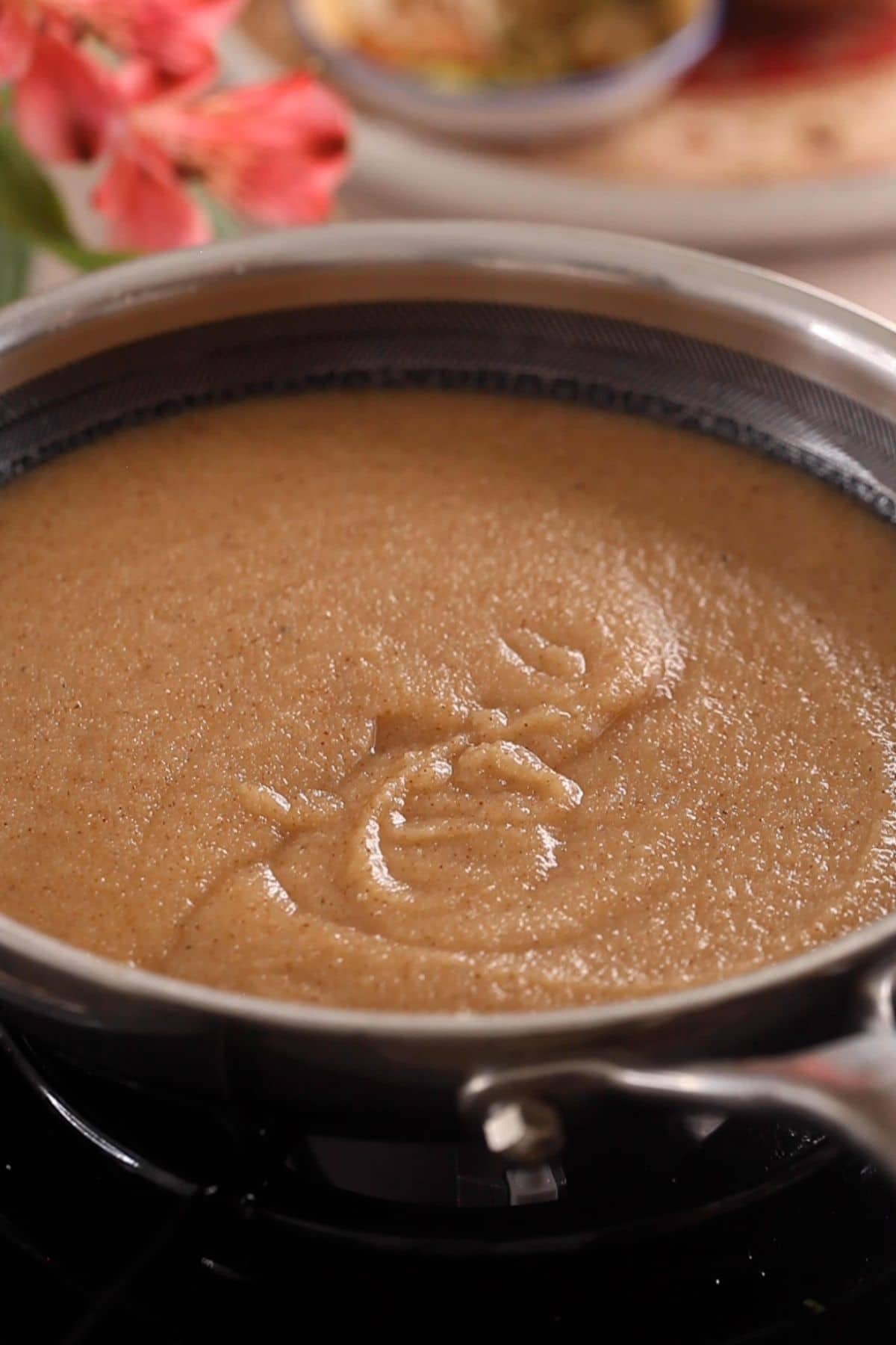 Syrup is absorbed by semolina and the halwa is soft and fluffy.