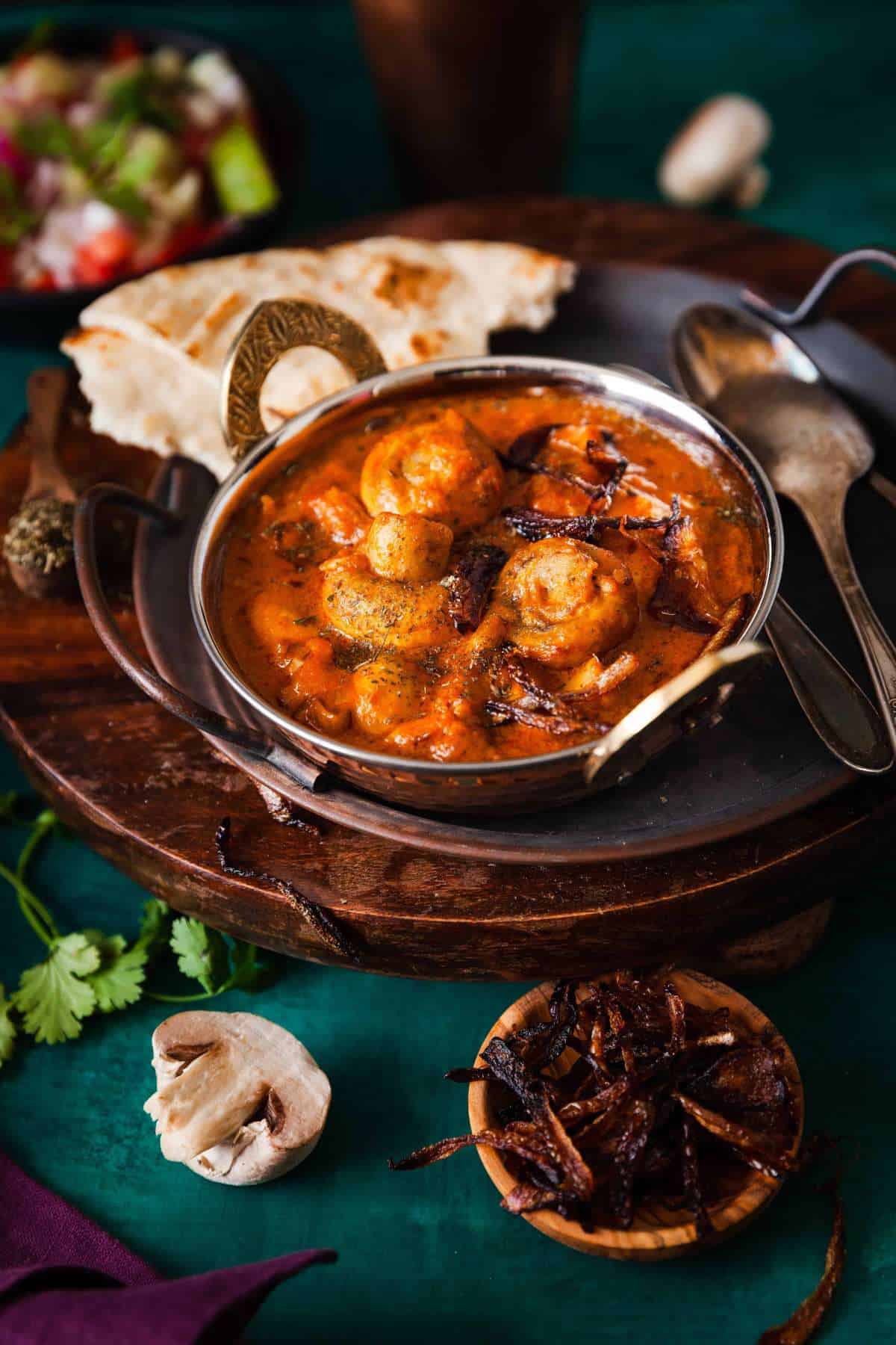 Side view of punjabi mushroom masala curry.